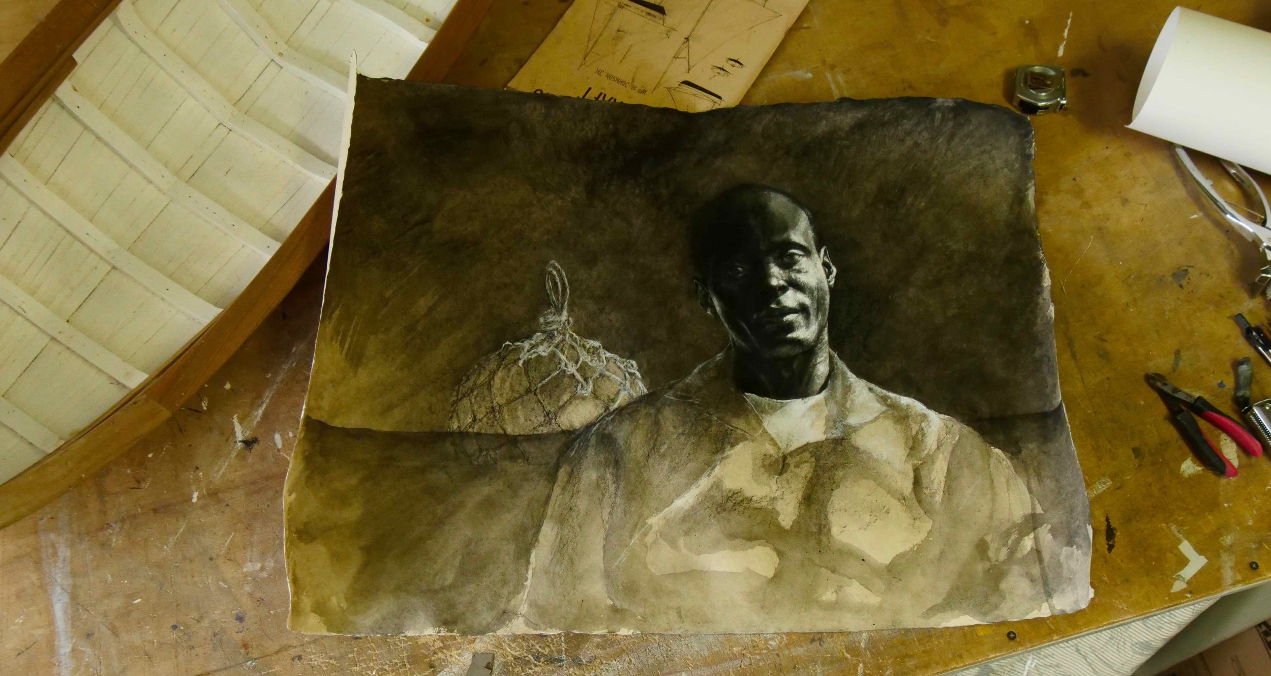 "When experimenting with hard paper, I found that charcoal did not work so I used casein and black ink." 