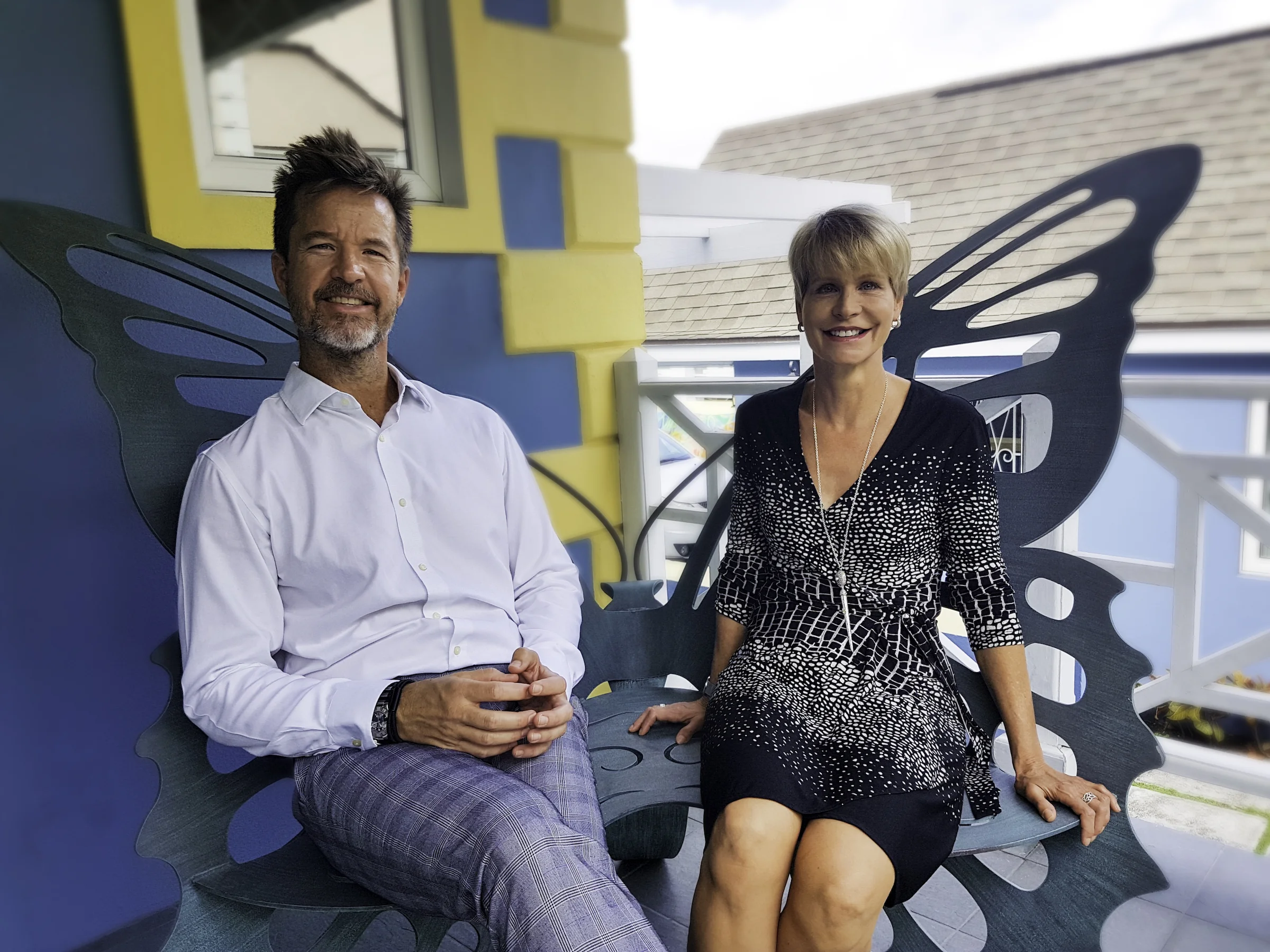 Shawn M. Sawyer and Saskia D"Aguilar perched on the porch of the D'Aguilar Art Foundation (DAF).