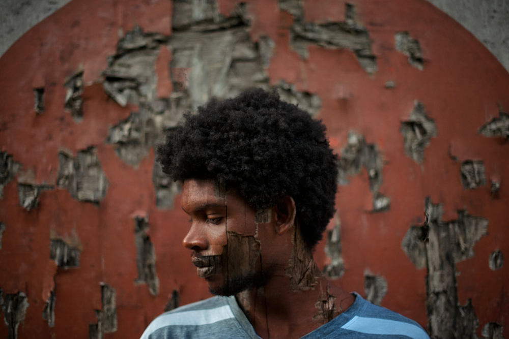 Photographer Delton Barrett pushing the boundaries of Bahamian art with his first solo show. This self portrait is entitled "Symmetry with Flaws."