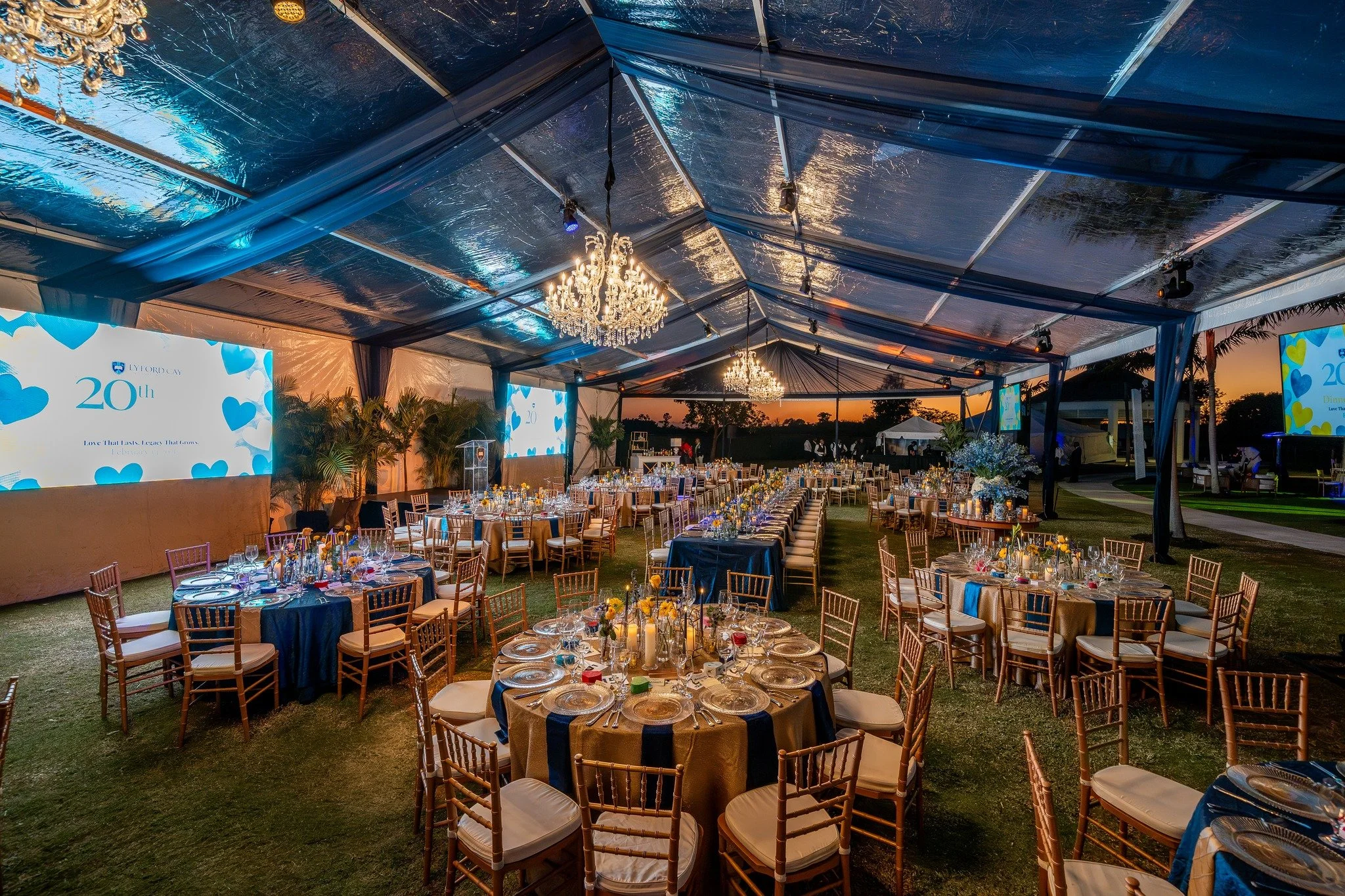 Under open skies and chandeliers, the 20th Anniversary LCIS Gala unfolded in layers of light, elegance, and intention.

Cocktails on the lawn. A luminous clear tent transformed for dinner and auction. An environment designed to feel immersive, celebr