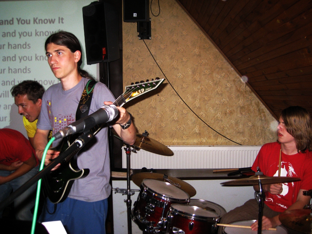   Members of The Poděbrady Sound Machine Lucáš (guitar) and Tonda (drums) rock out.  