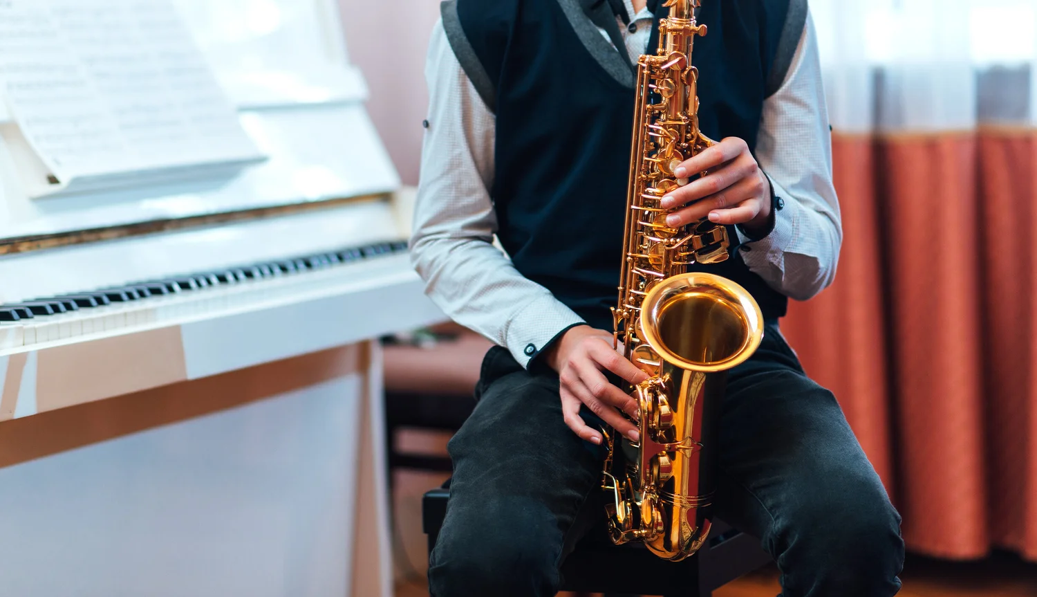 Student playing saxophone