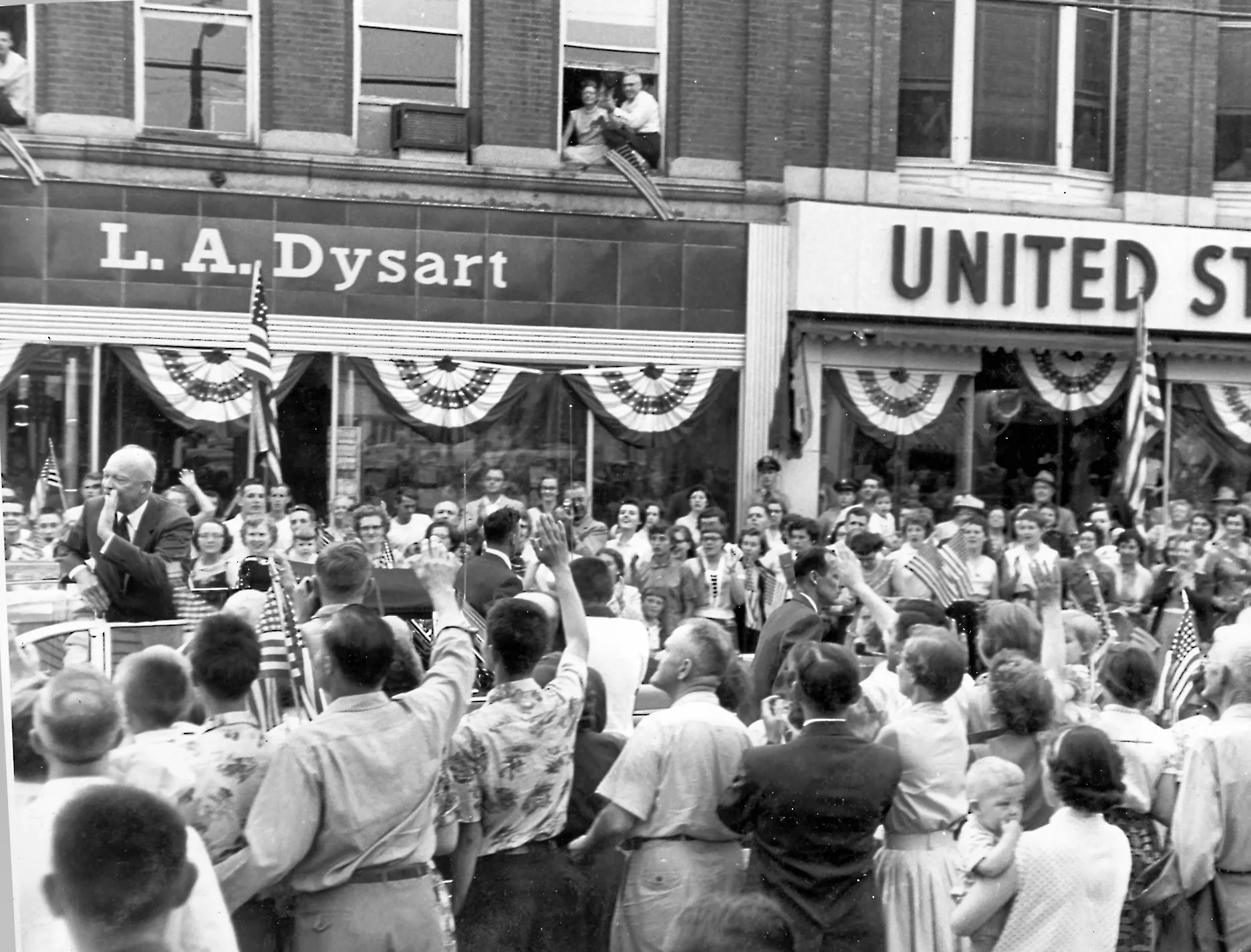 Slightly unrelated so I've tucked it away at the bottom: another shot from the 1955 Eisenhower stop in Pittsfield. I mentioned above that the town department store was owned and operated by my (maternal) grandparents, Lawrence and Mabel Dysart. That's them leaning out a second floor window at their store and a few windows over my uncle is in partial view. My grandfather was a real character, and I can say unequivocally that Big Gay Ice Cream would never have been born without some of the lessons he taught me.