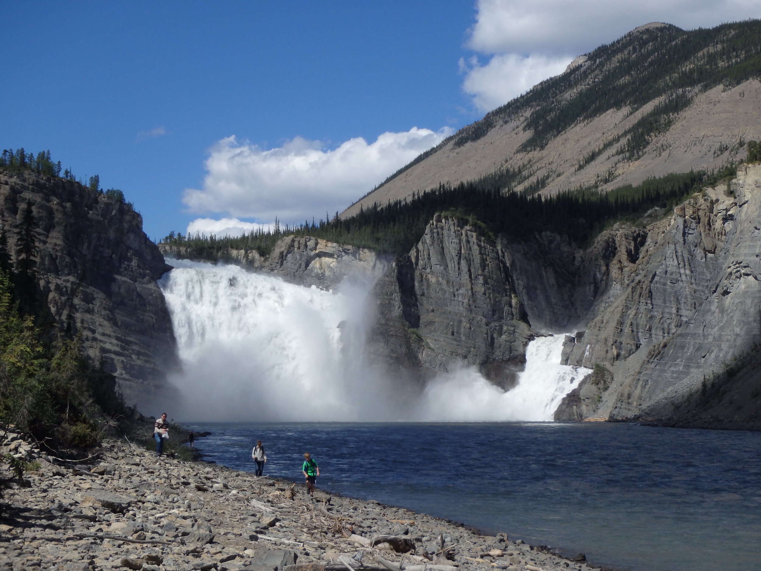 people at the base of virginia falls.JPG