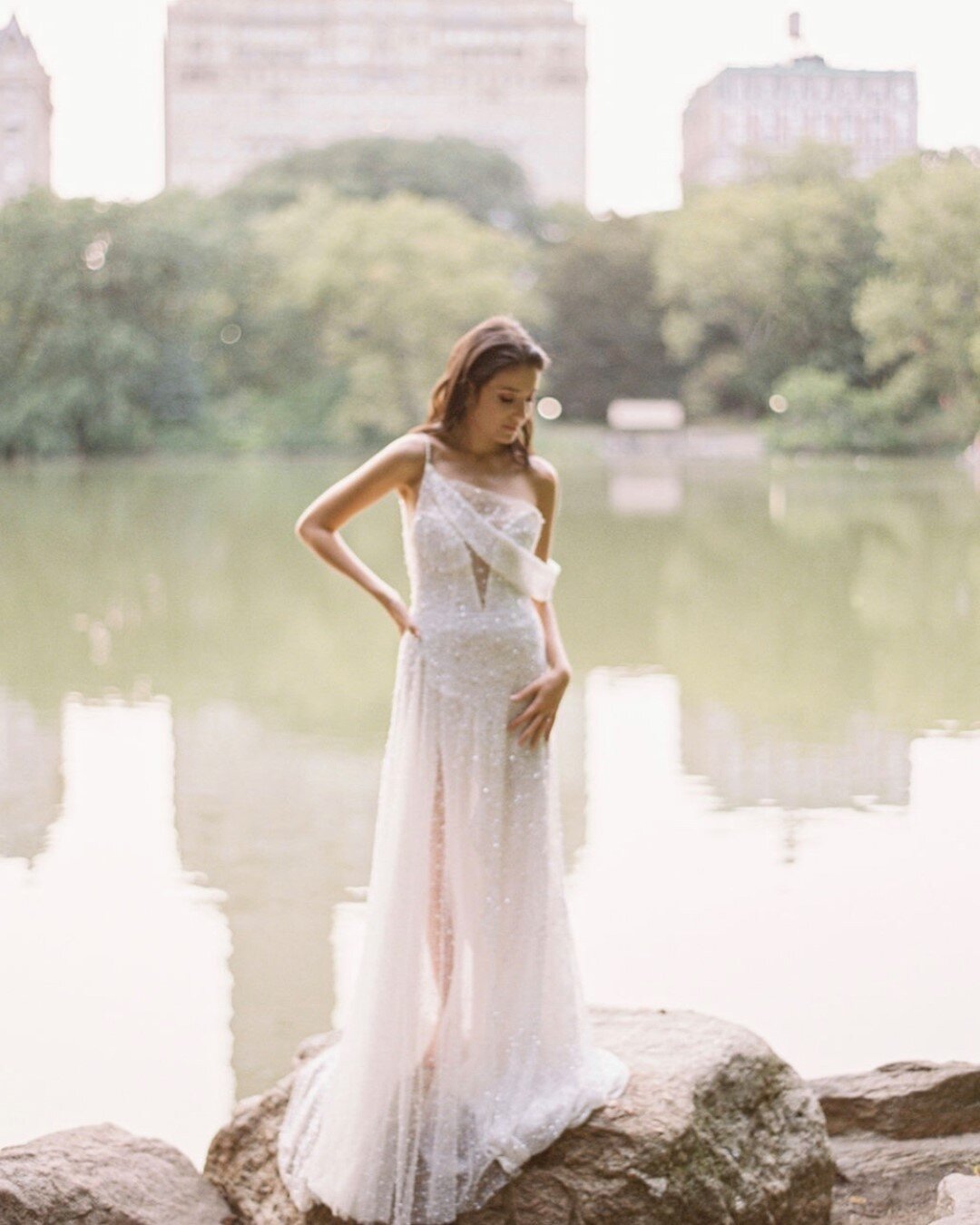 Shaina in this breathtaking @helenakolan gown.  Her and Giovanni met only 6 months prior to this photo. They fell in love and wanted to start a family of 10 kids. Shortly after this intimate ceremony they were over joyed with the news they would be w