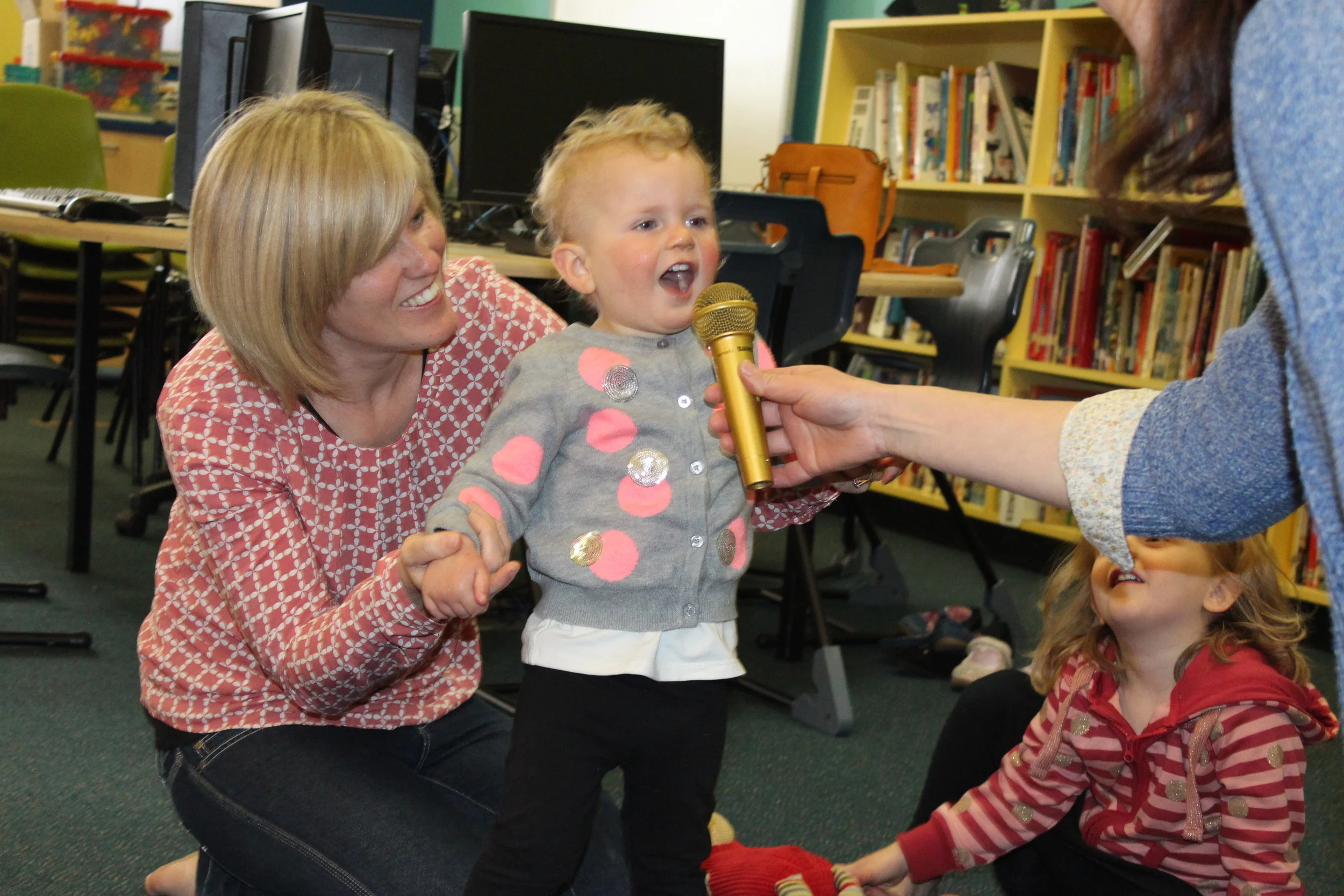Singing with the 'golden microphone' at TinyTaters