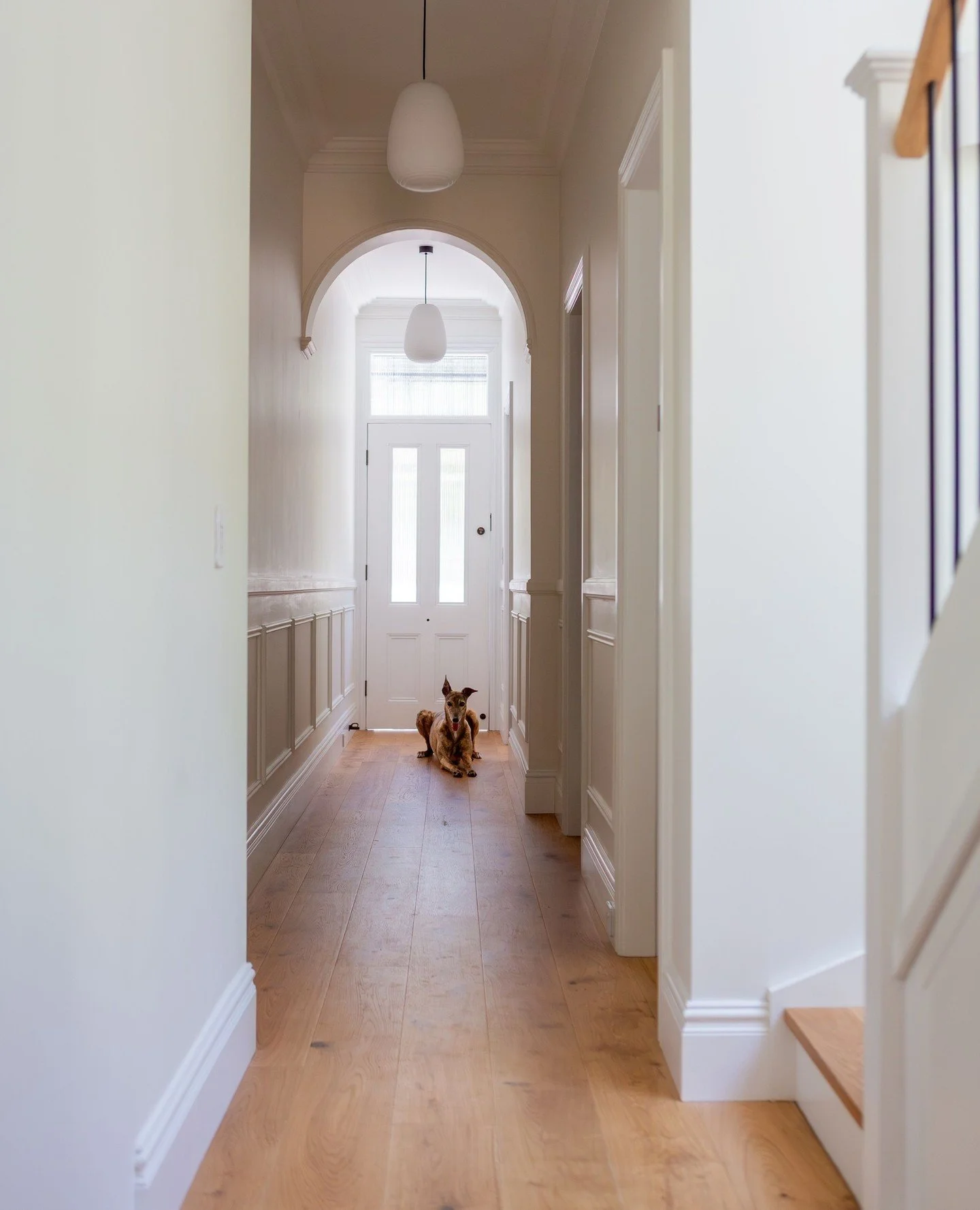 PROJECT :: Newtown Terrace⁠
⁠
A final look at the spaces that connect it all.⁠
⁠
The restored iron lacework, patterned front porch tiles and panelled hallway honour the home&rsquo;s Victorian origins, while warm timber floors and restrained detailing