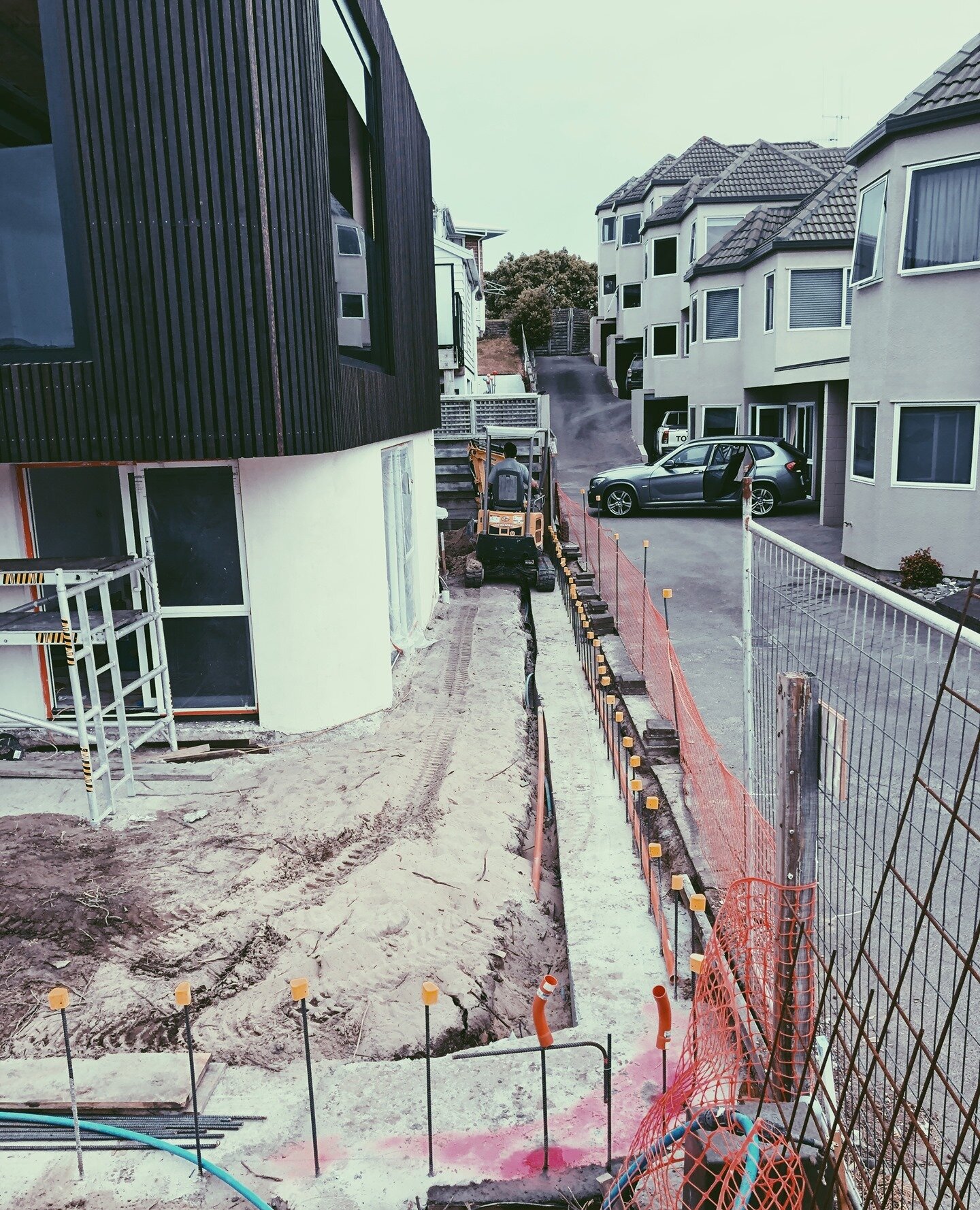 Fence foundation finally completed!⁠
Final plumbing works being installed.⁠
Tight space + digger requires a skilled operator -@TasmanPlumbingContractors 💪⁠
⁠
#renovation #rainscreen #shadows #construction #mountmaunganui #tauranga #localbuilder #bui
