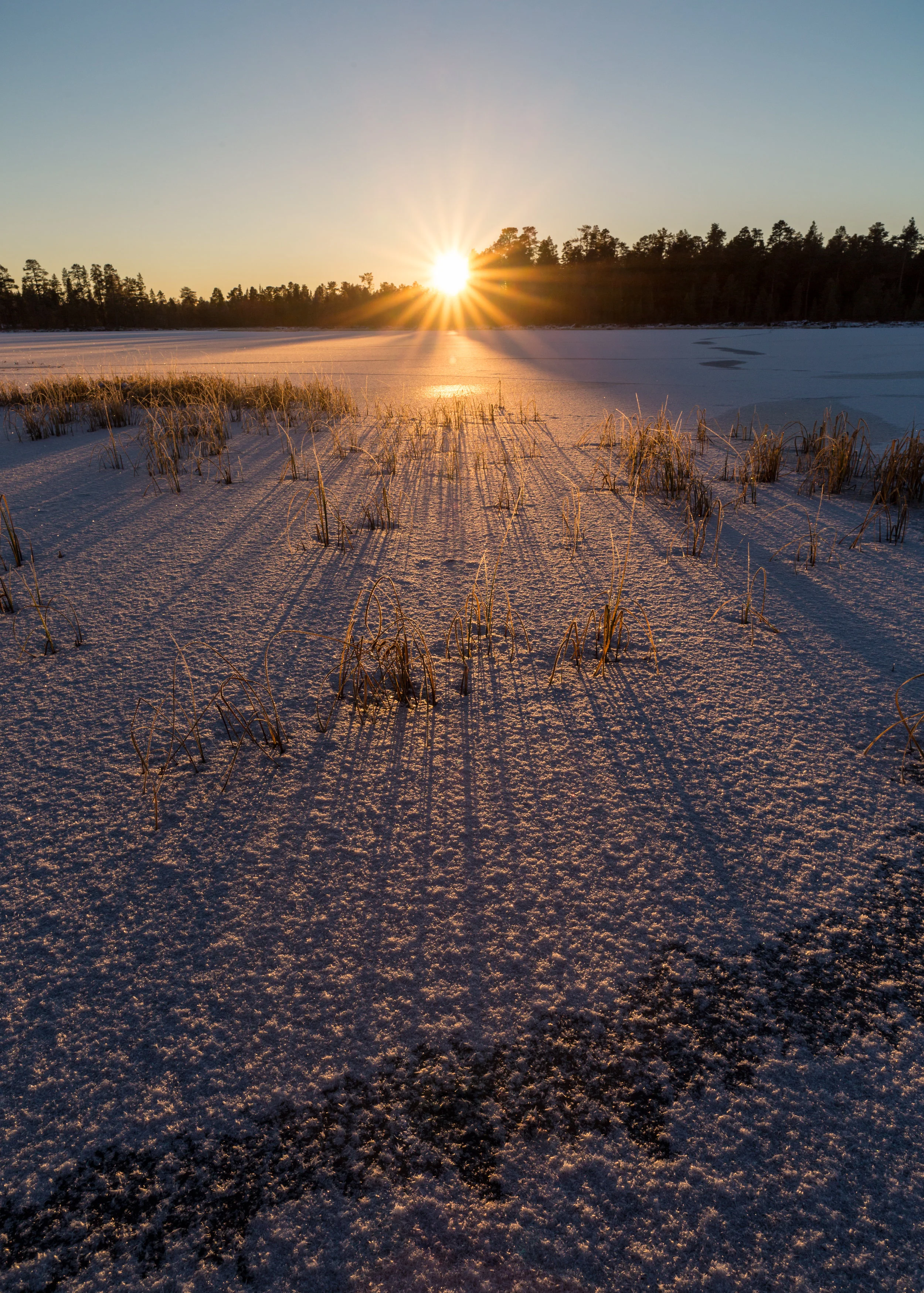 Late Arctic light on a frozen lake