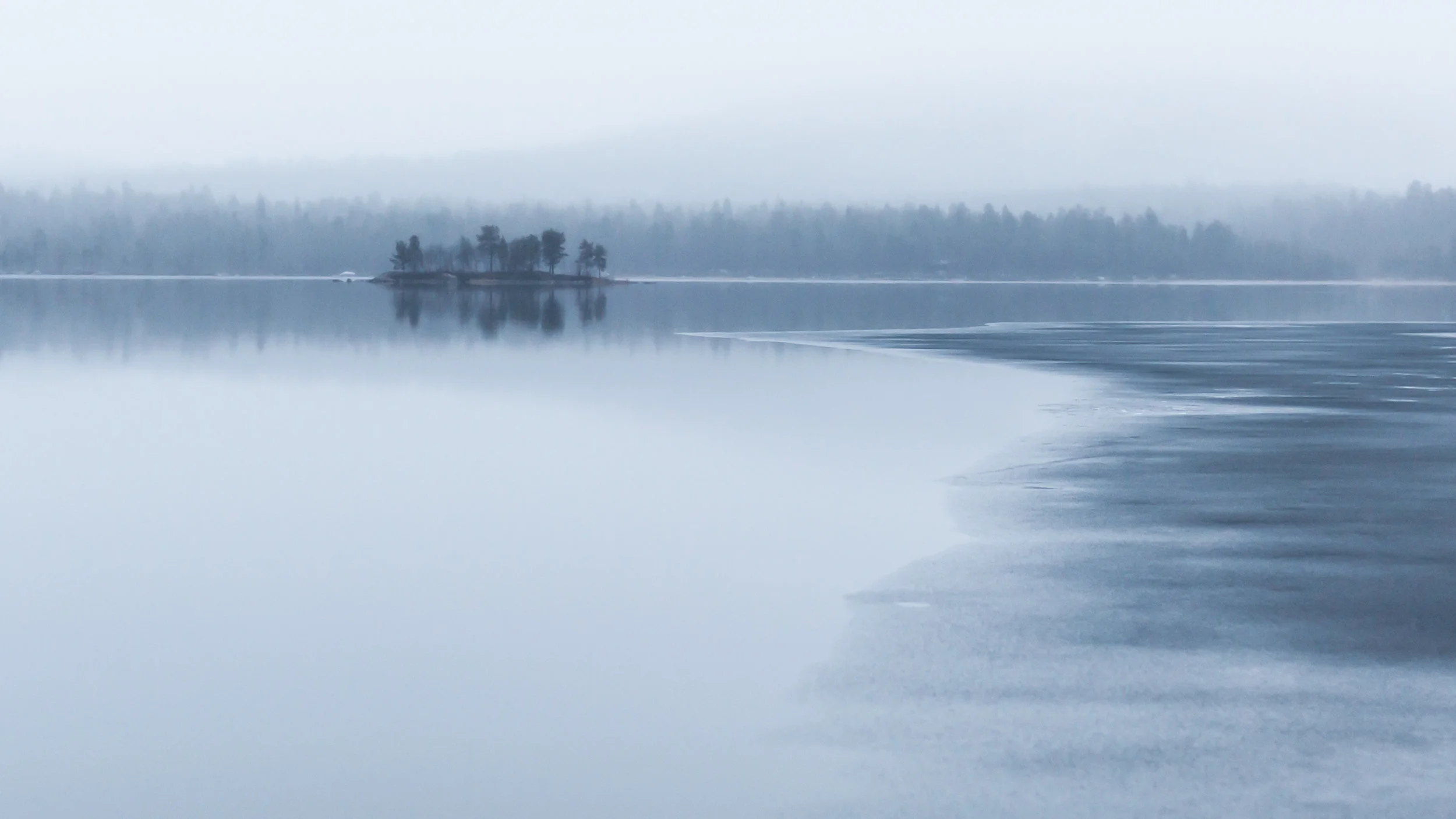 The start of the big freeze. Ice encroaching on one of the hundreds of lakes. 