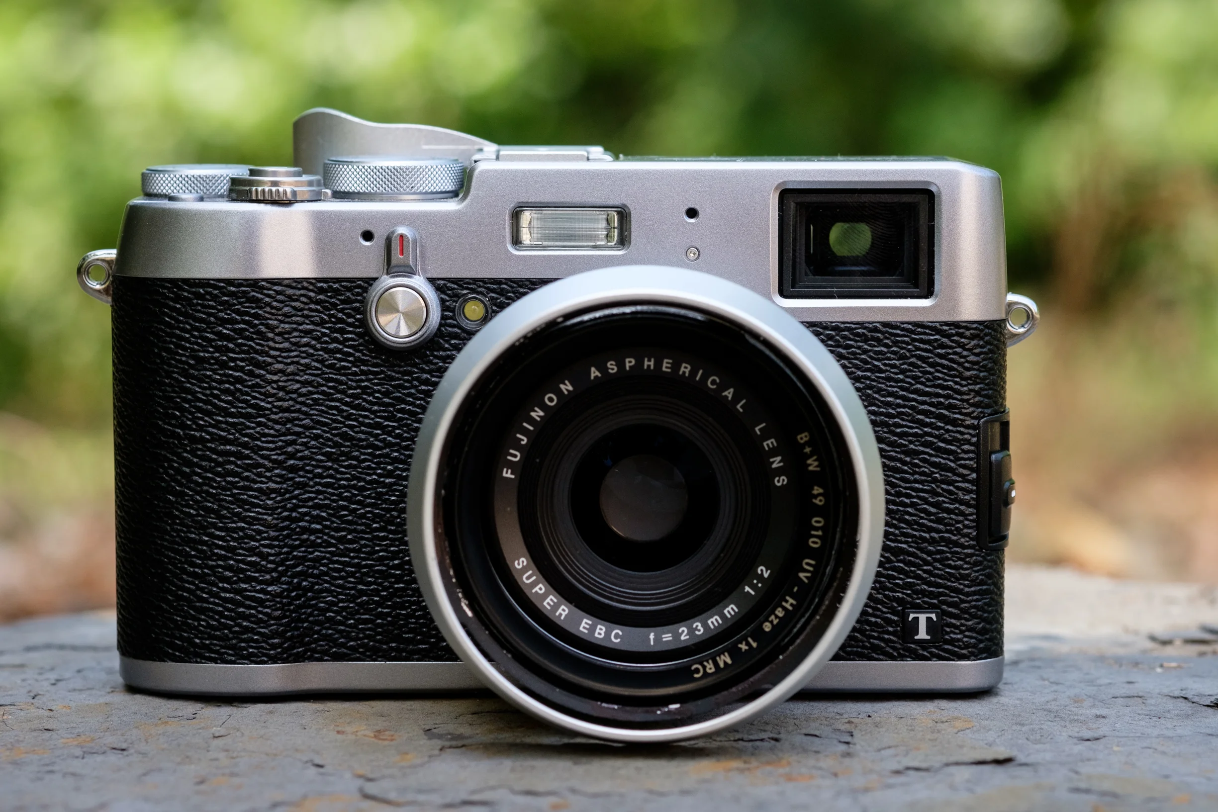 The Fujifilm X100T. This has the exact same sensor as the X-T1 so the image quality is the same. This has a fixed 23mm f/2 lens and is very small. This is an excellent travel camera and very fun to use.