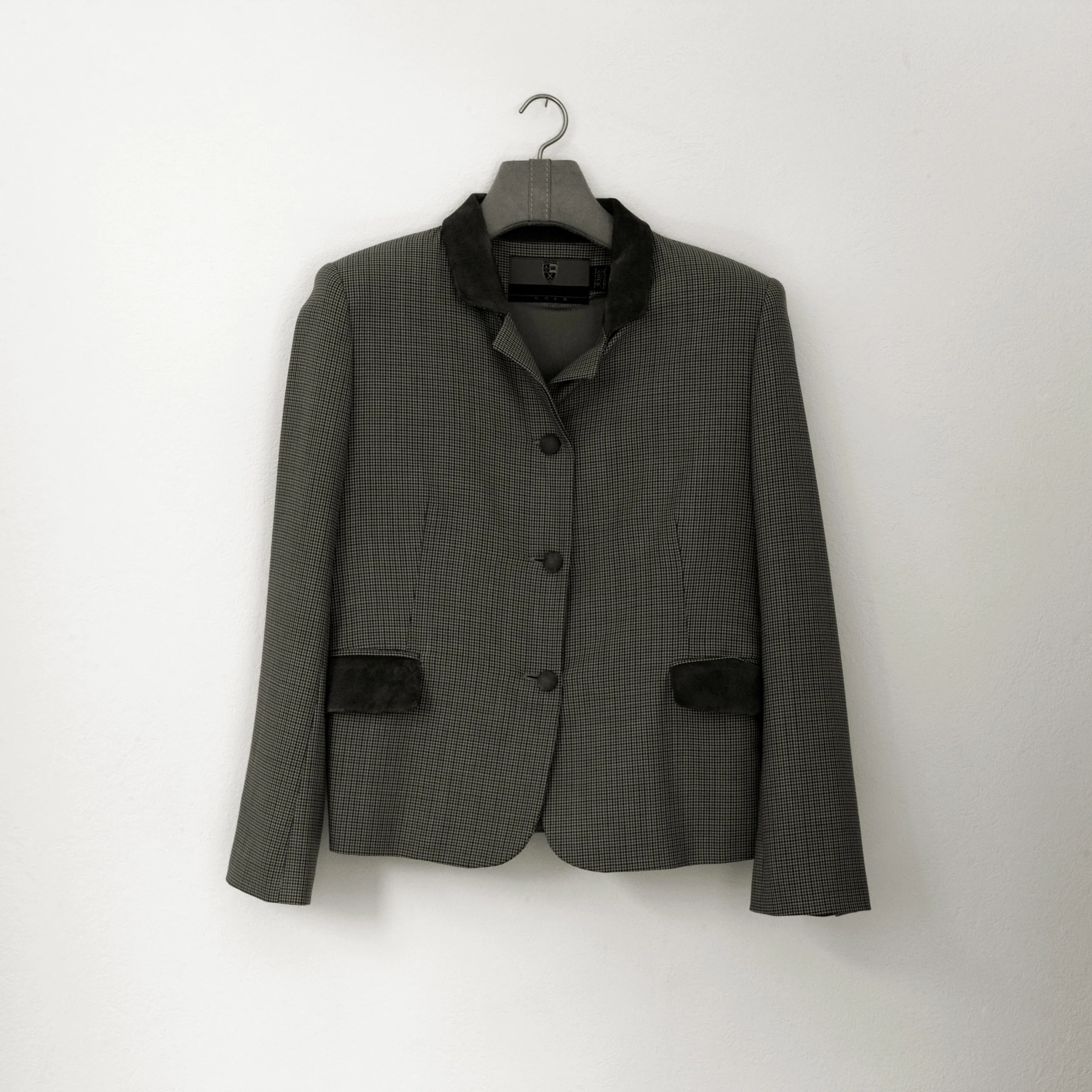 Bulletproof (Ladies Suit) Archival pigment print on cotton paper, mounted on aluminum. 40 x 40 in.