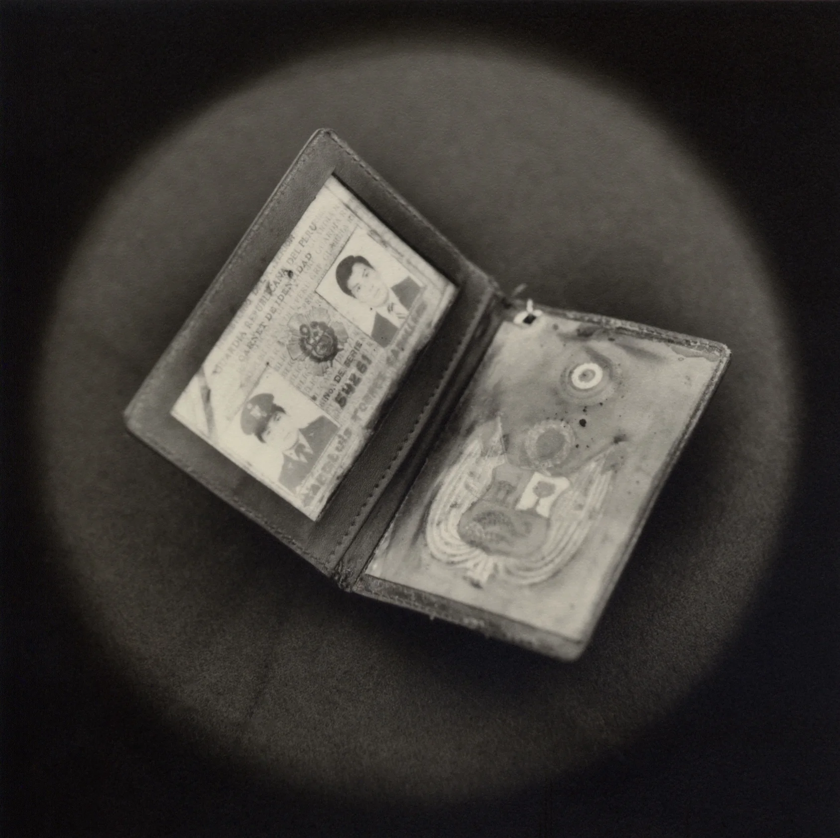 The Lost Steps (Fake police ID used by terrorist) Toned gelatin silver print. 16 x 16 in. 
