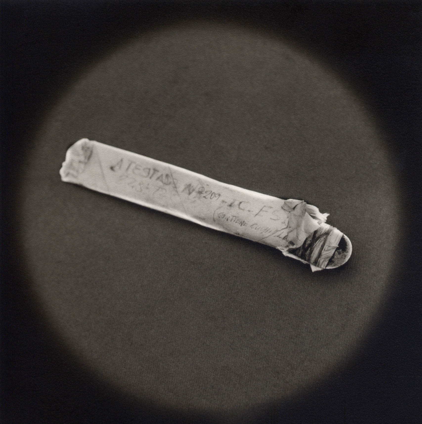   Crudely fabricated knife confiscated as evidence   Toned gelatin silver print.   16 x 16 in. (40 x 40 cm.) 