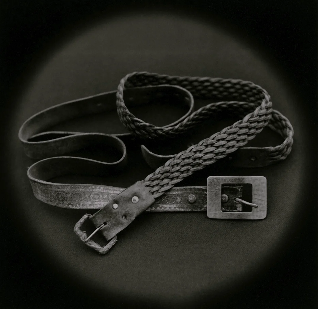 The Lost Steps (Belts used by psychologist Mario Poggi to strangle a rapist during police interrogation) Toned gelatin silver print. 16 x 16 in. 