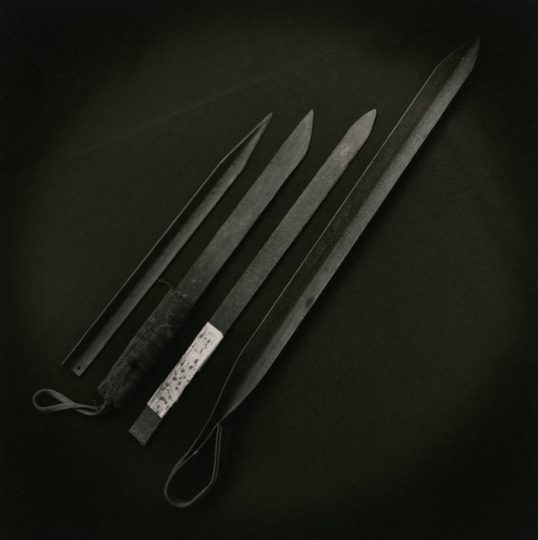   Confiscated weapons from maximum security prison   Toned gelatin silver print.   16 x 16 in.&nbsp; (40 x 40 cm.) 