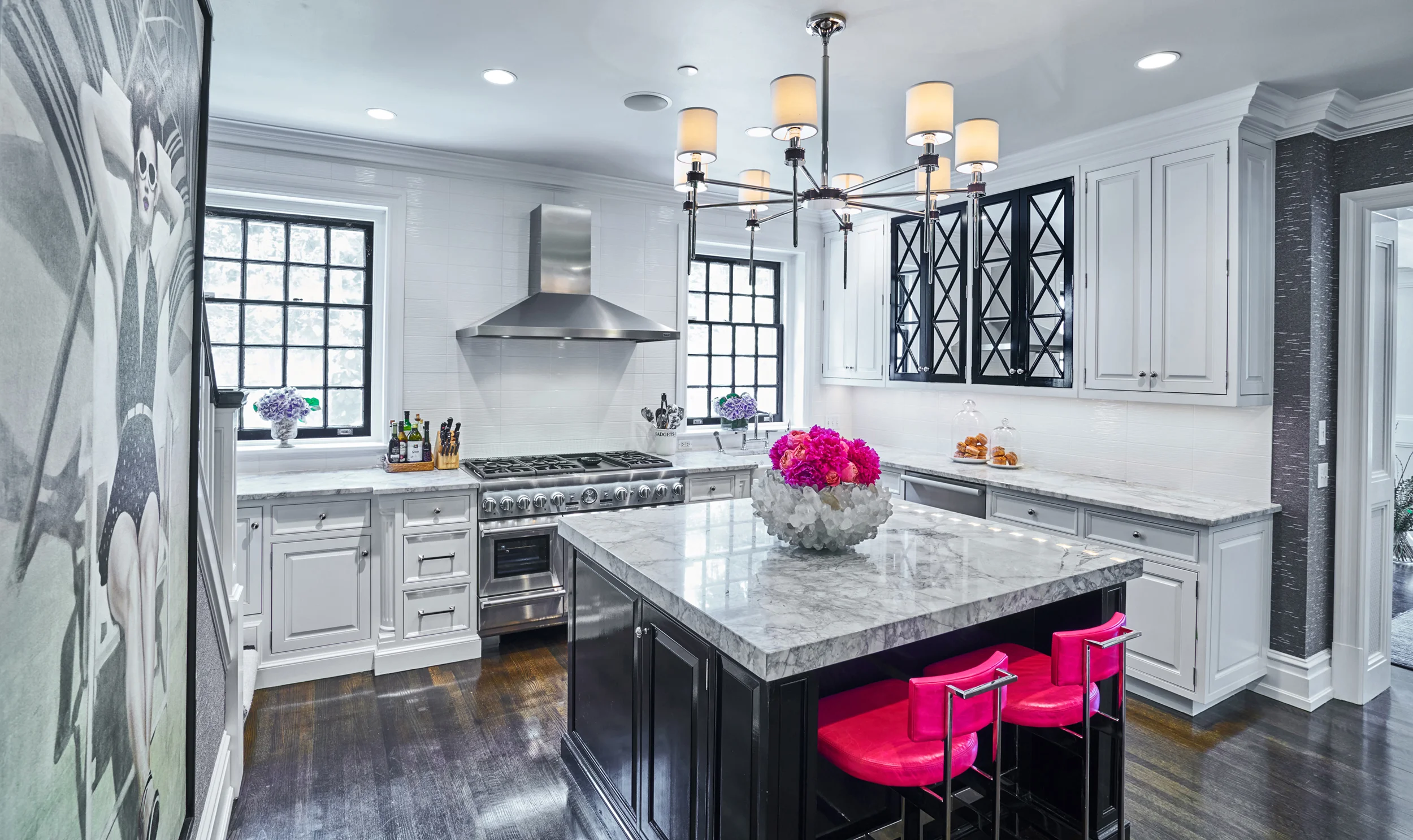 Art adds interest to this bold and graphic entertaining space.