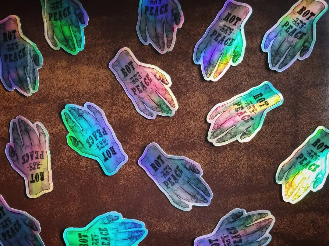 ⚰🌾Rot In Peace holo stickers are LIVE on the shop 🌾⚰ Return to the soil after your life of toil! Did you know that there are several ways to continue caring for the environment after you die? To learn more about green/conservation/prairie burial, v