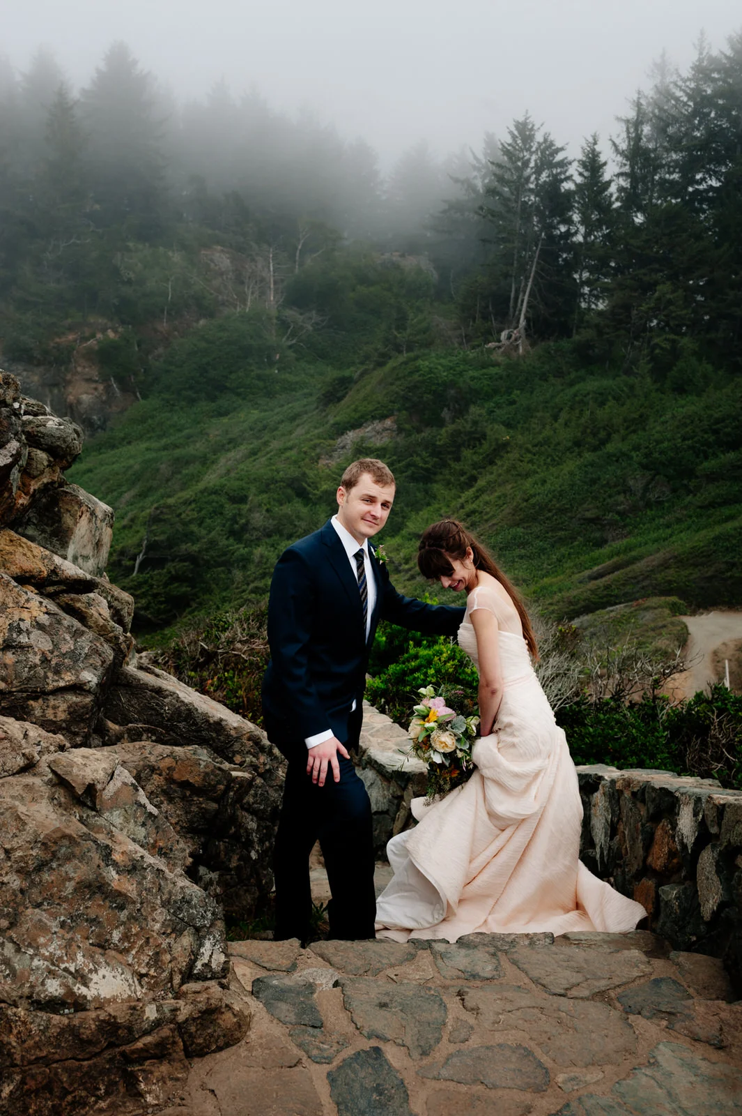 HumboldtCountyPhotographerPatricksPointRomanceWeddingRockBrideGroomStaircasePause-3.jpg