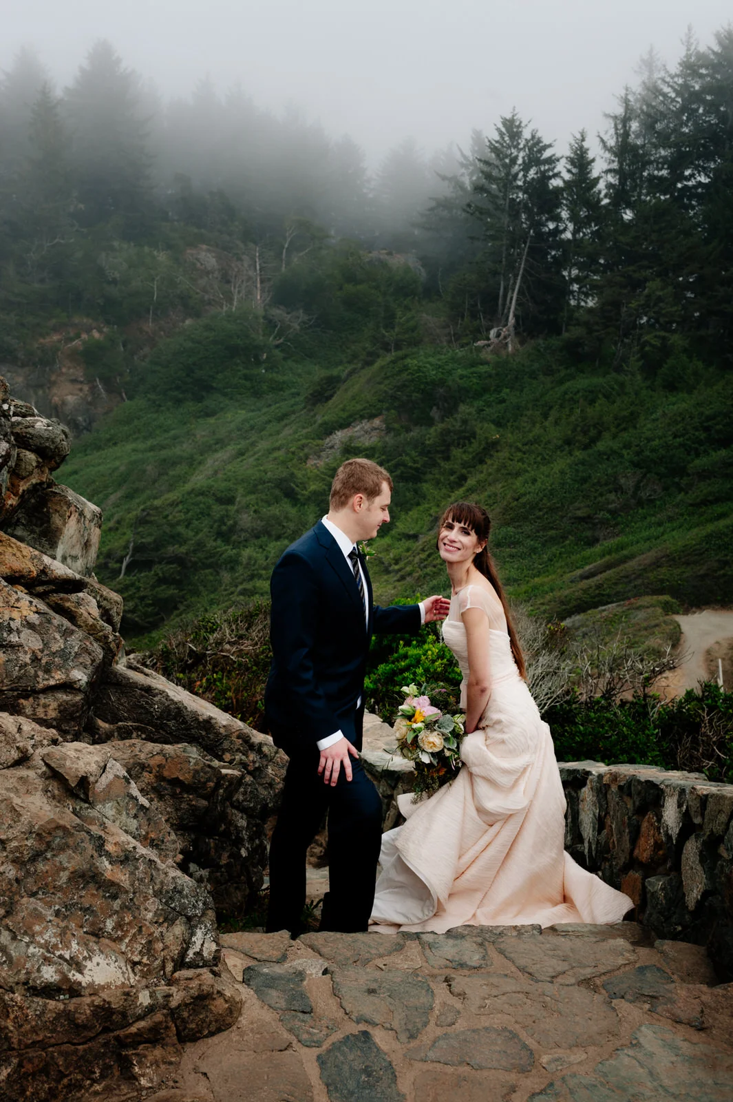 HumboldtCountyPhotographerPatricksPointRomanceWeddingRockBrideGroomStaircasePause-2.jpg