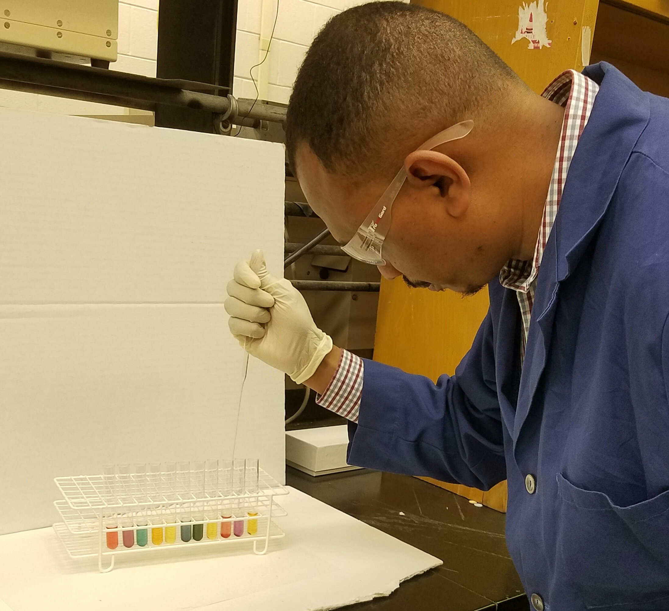 Siddieg working with his colorful detection solutions.