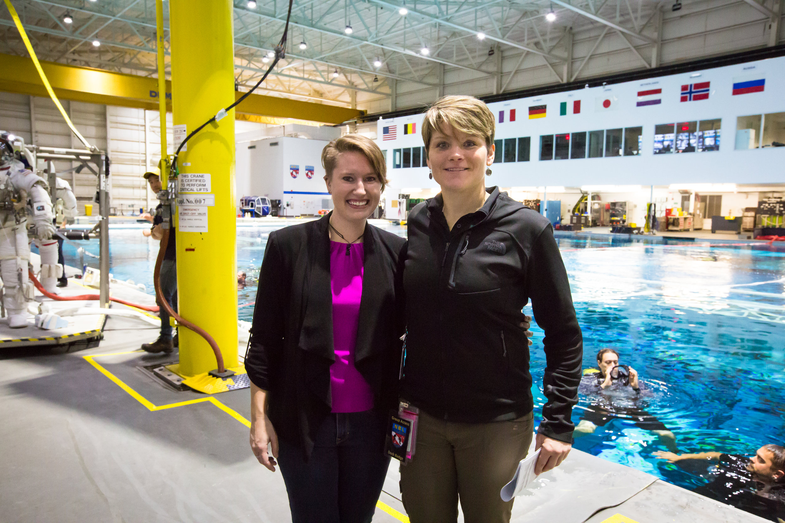 LSU Martian geologist researcher Nicki Button (left) with astronaut Anne McClain (right) at the NASA Neutral Buoyancy Lab. Photo by Paige Jarreau.