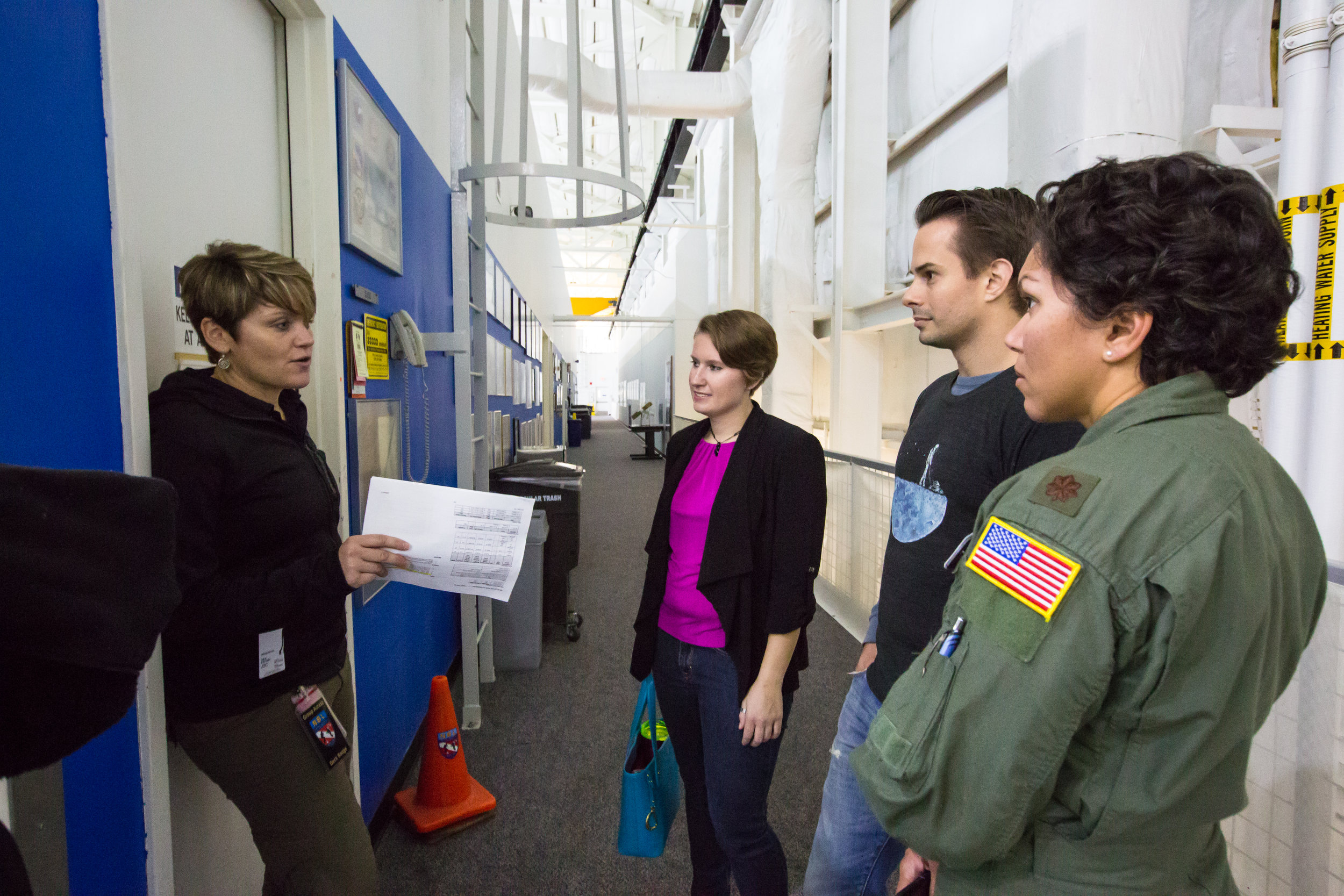 Anne McClain leads a tour at NASA NBL
