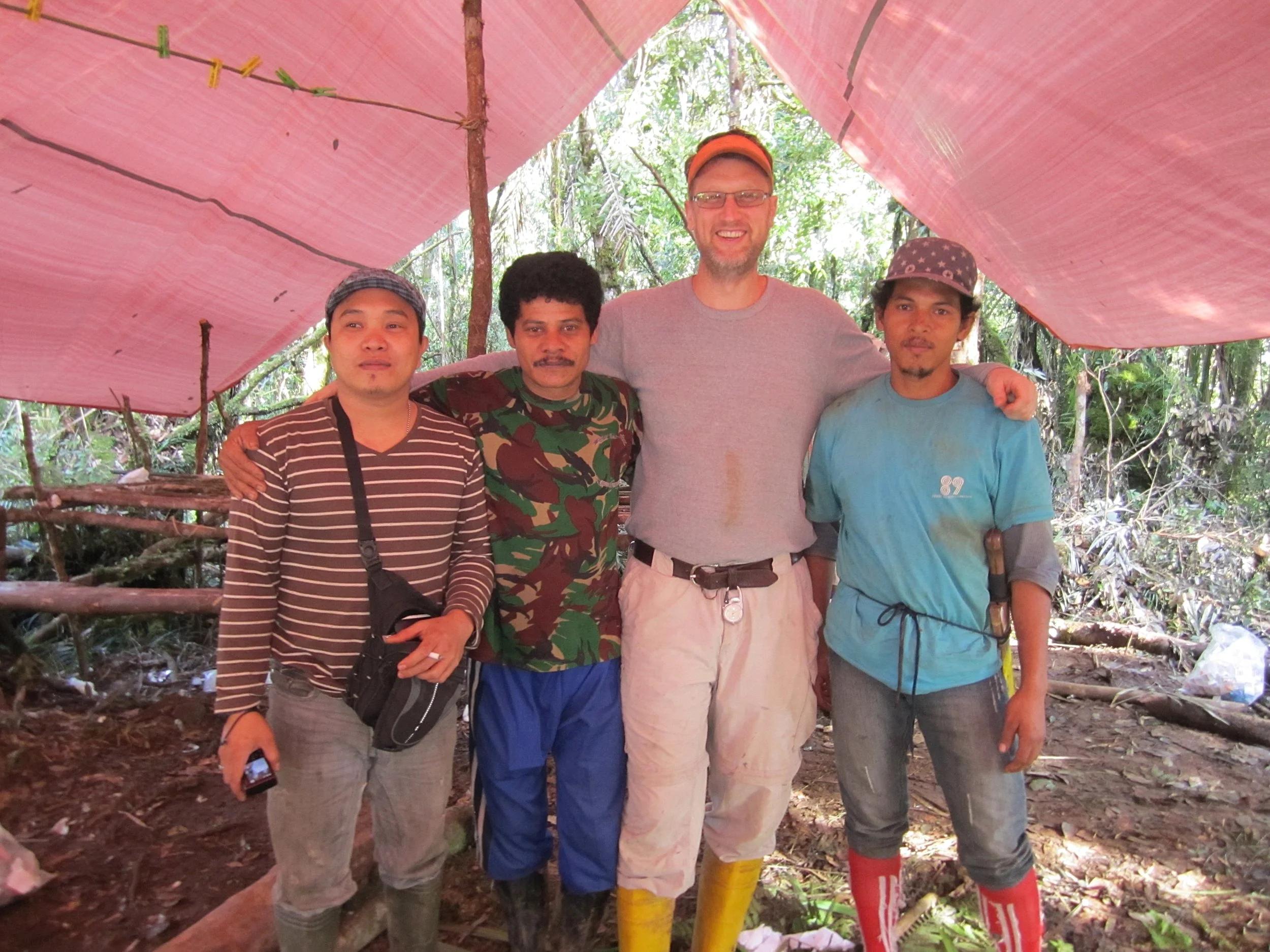 Photo of Esselstyn (center) with local guides and field assistants.