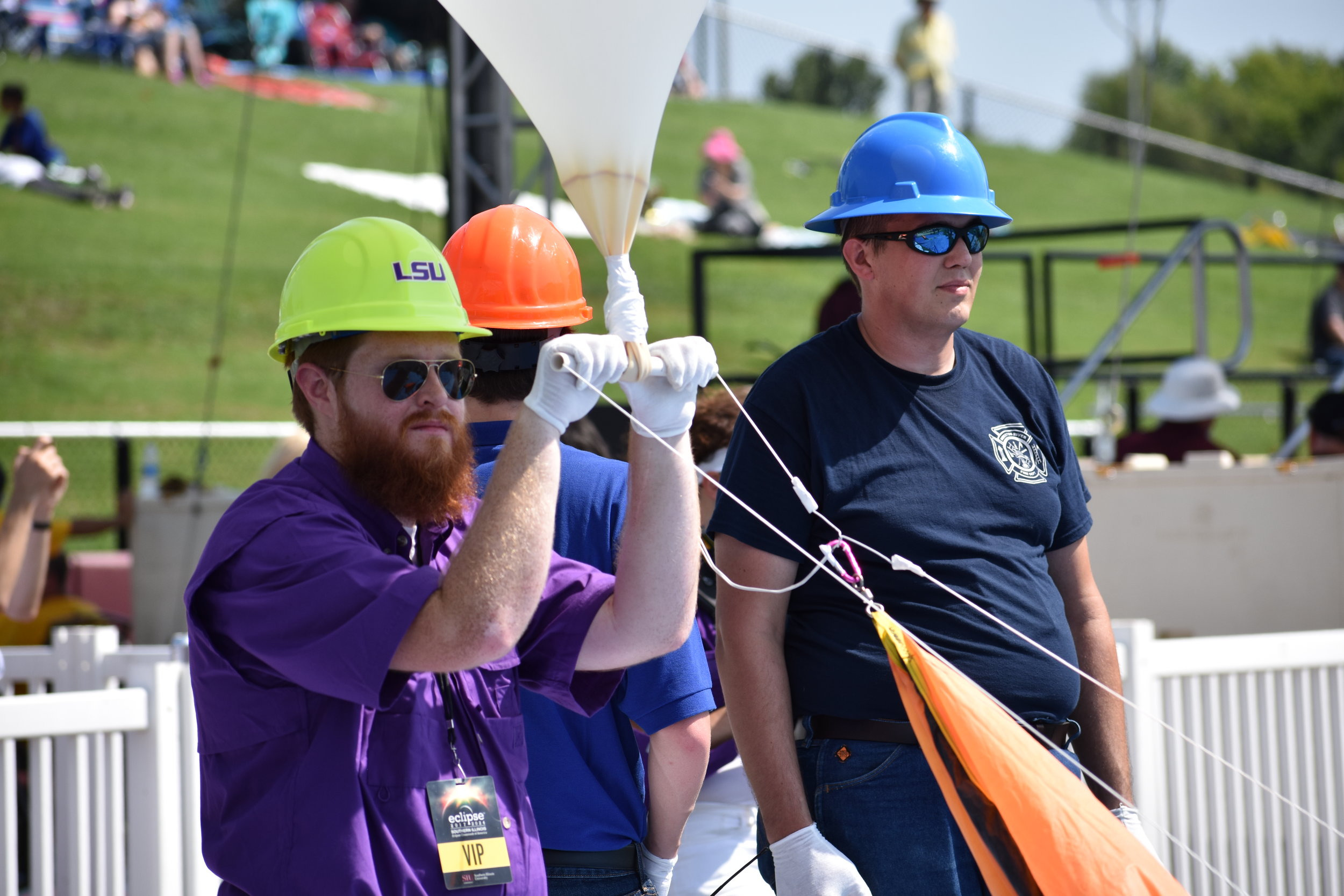 Brad Landry holds the eclipse balloon