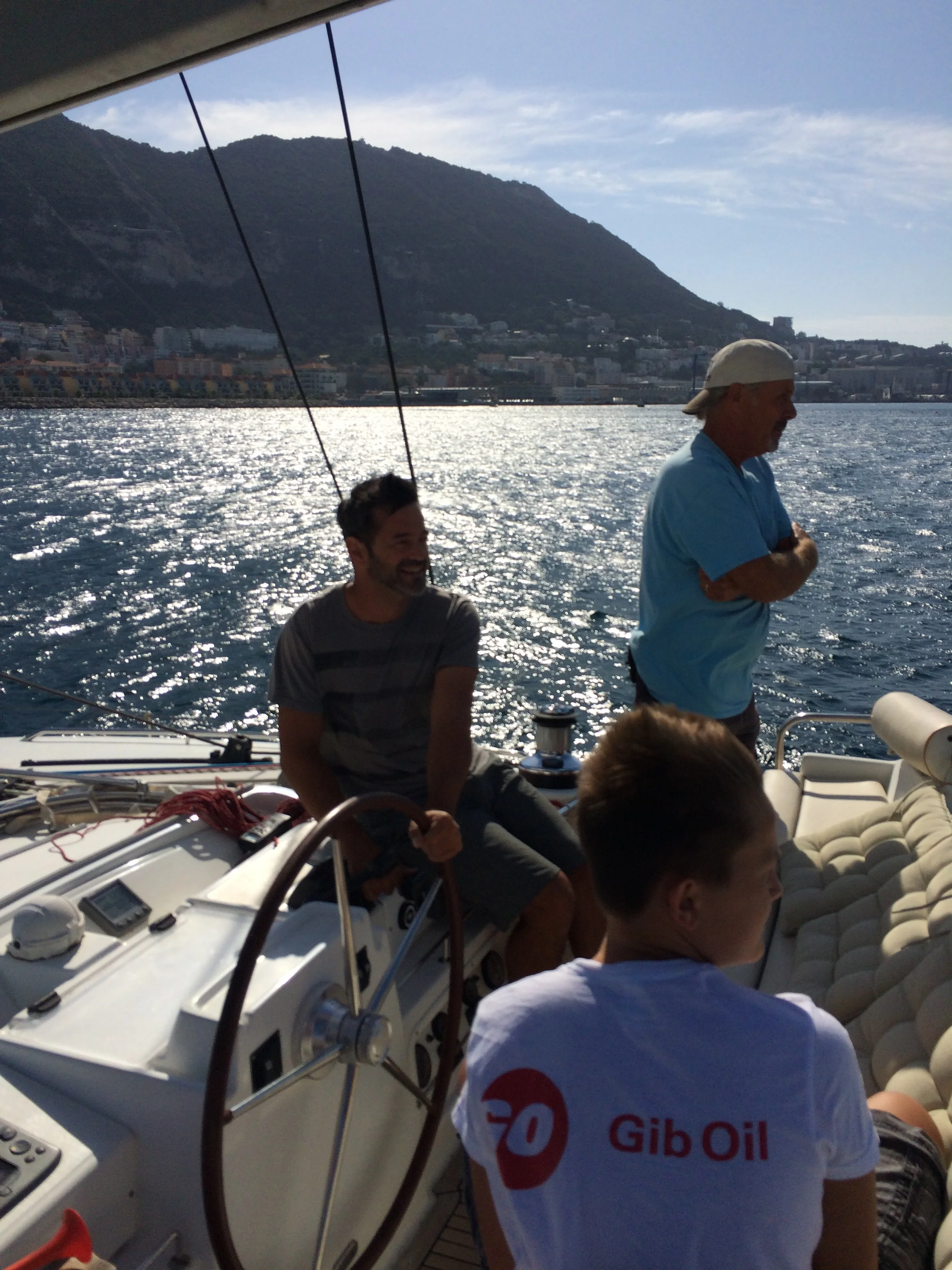 The other John helping us practice at the helm
