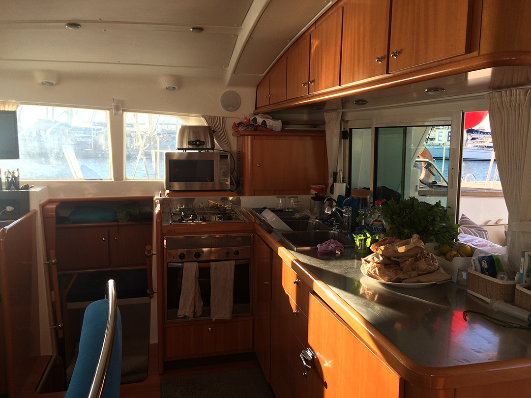 galley with stove, gas burners, 3 sinks, microwave, fridge, freezer and yup, running water! 