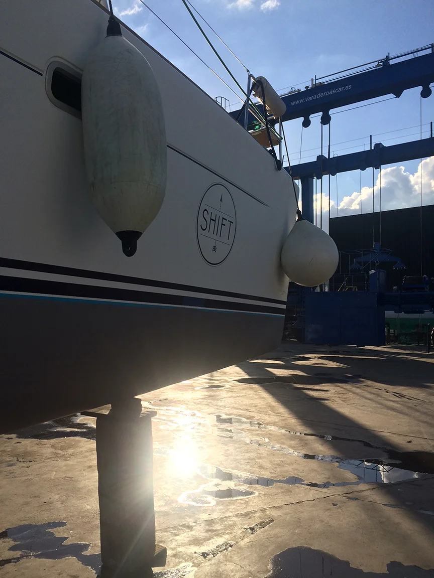 in the boatyard; simply incredible that we're held up by these wooden posts!