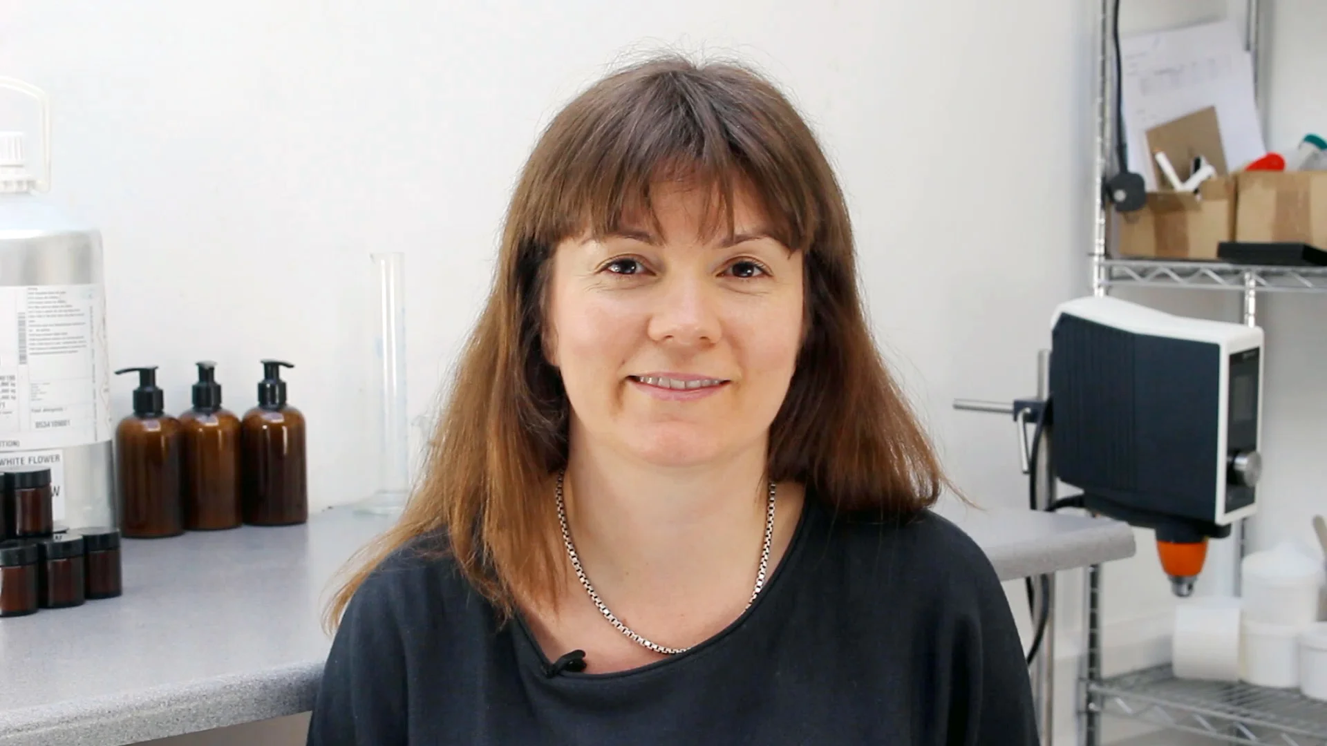 Laura Headshot with background.jpg