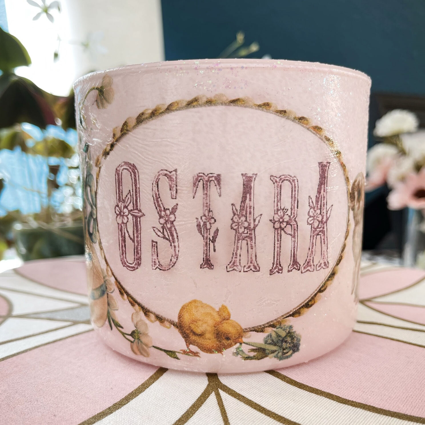 Some words that correspond with Ostara and spring are:
Rebirth
Renew
Refresh
Rejuvenate. 
These words apply perfectly to this DIY craft, as it all starts with upcycling an empty used candle jar and decoupaging onto it to renew it and give it a new pu