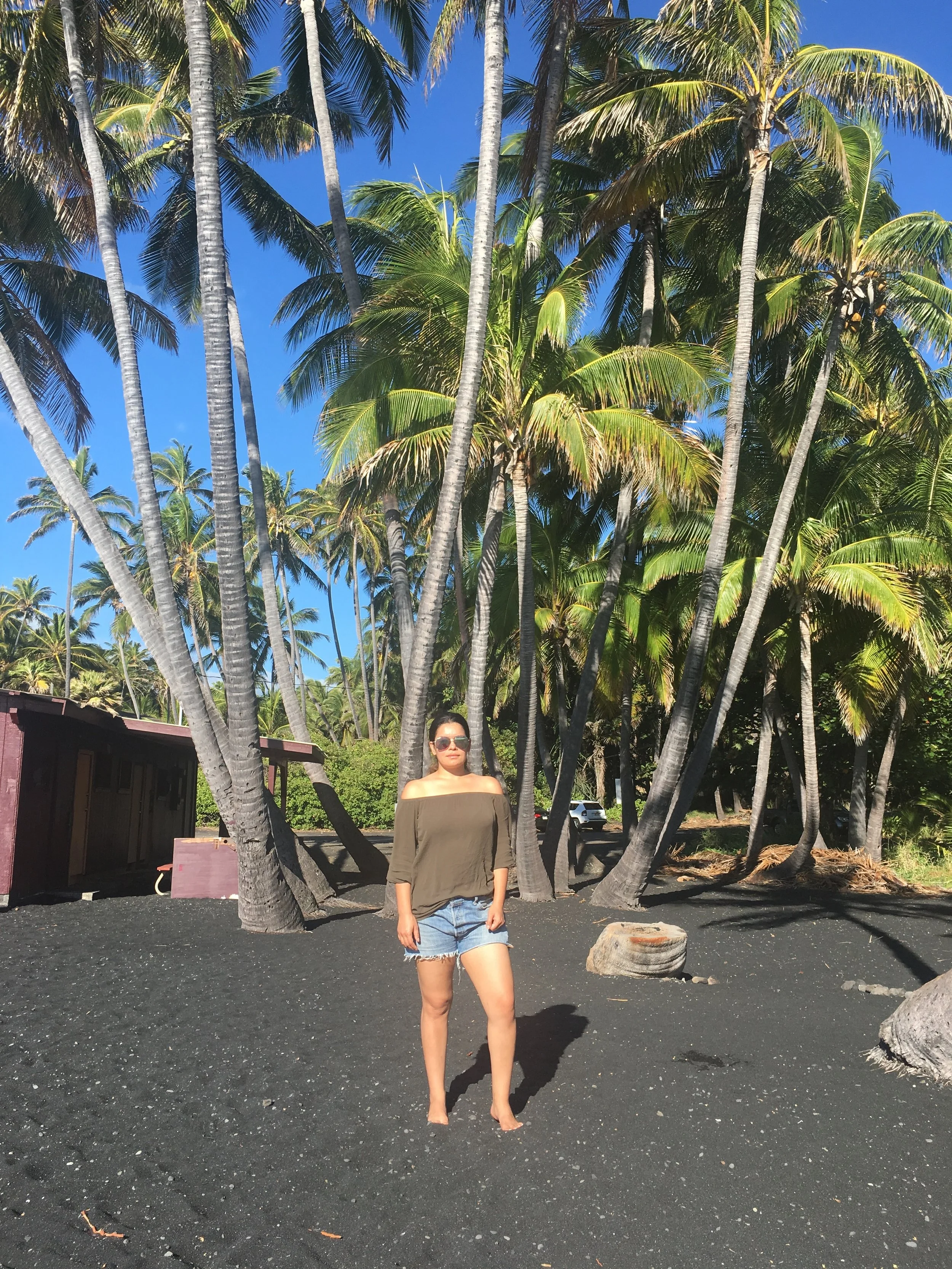 Olive green off the shoulder top from the take one, leave one pile at the hostel (free), Levi's cutoffs $5, 2 year old worn in Birkenstocks ($90), Steve Madden sunglasses