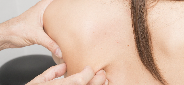 Pain between shoulder blades. A closer look at rhomboid pain