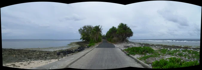 Tuvalu Road in all its glory - Lagoon to the left, Pacific Ocean to the right...