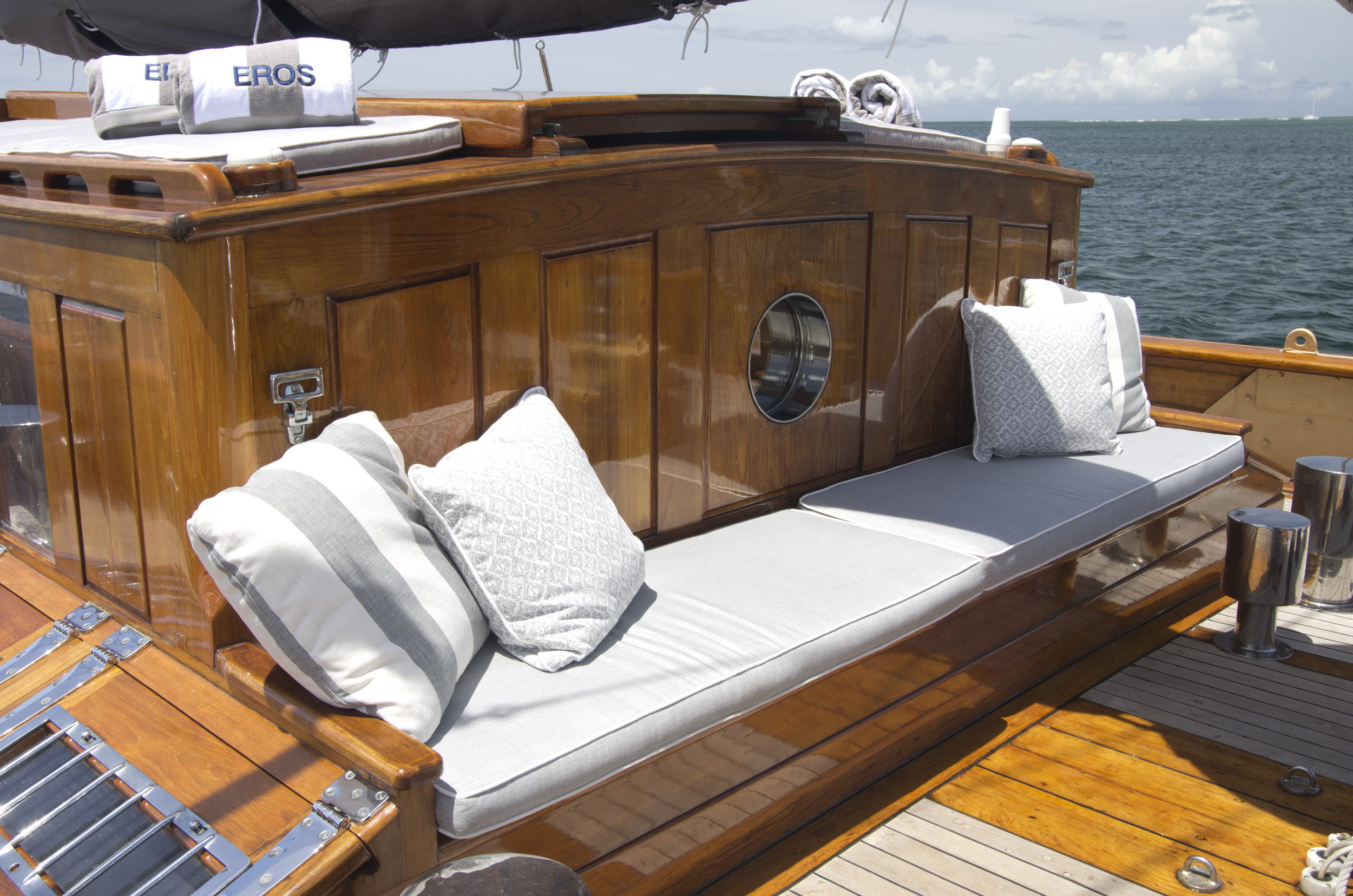 bench on deck of vintage yacht Eros