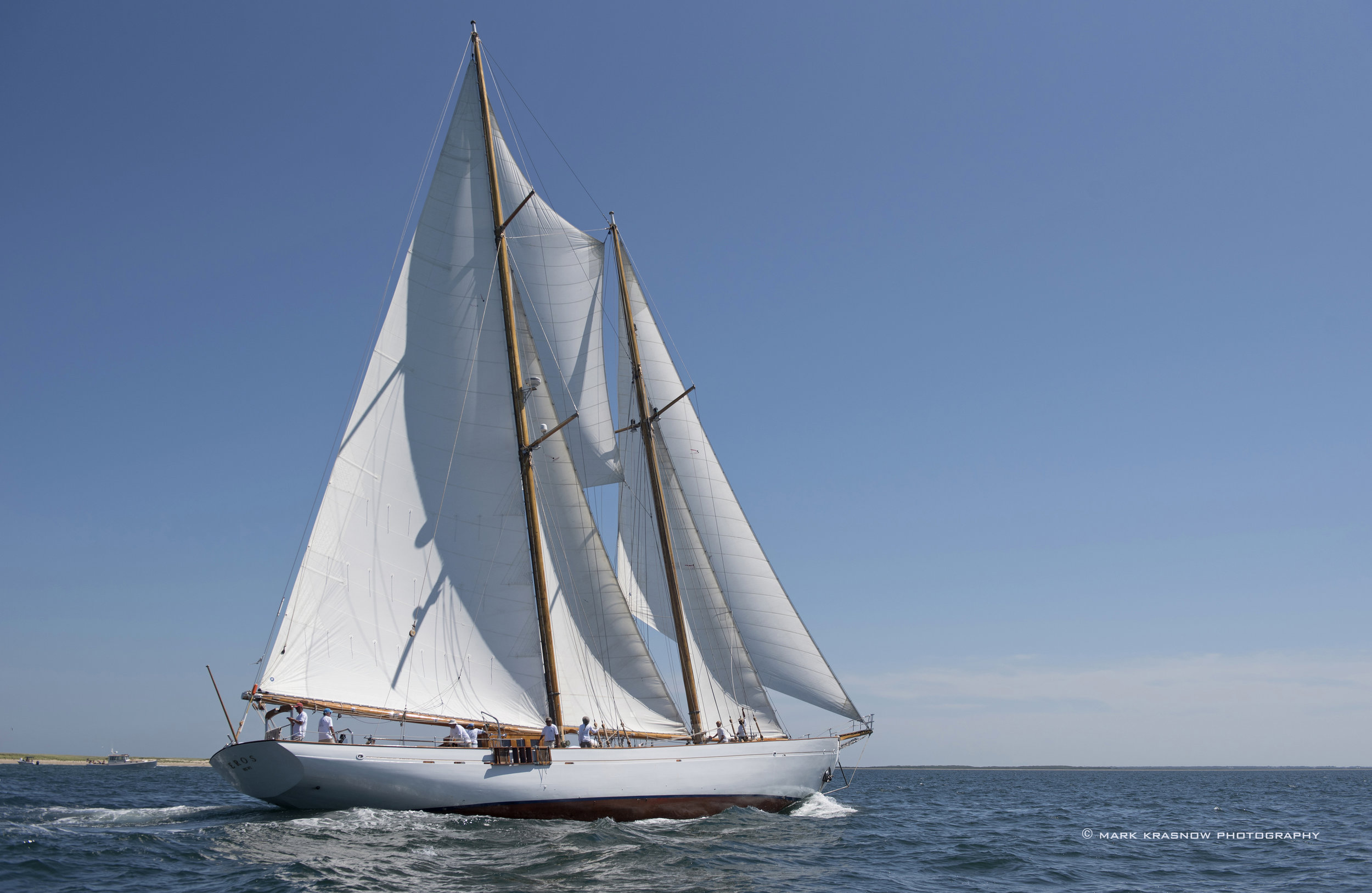 side photo of vintage sailing yacht