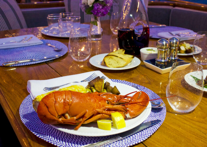 Lobster dinner on classic sailing yacht Eros