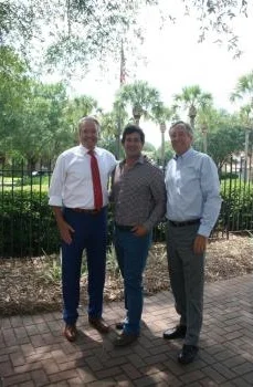 Bin 526 developers Mike White (left) and Bill Hoffman (right) welcomed winemaker Robert Mondavi, Jr. (center) to Daniel Island last week.