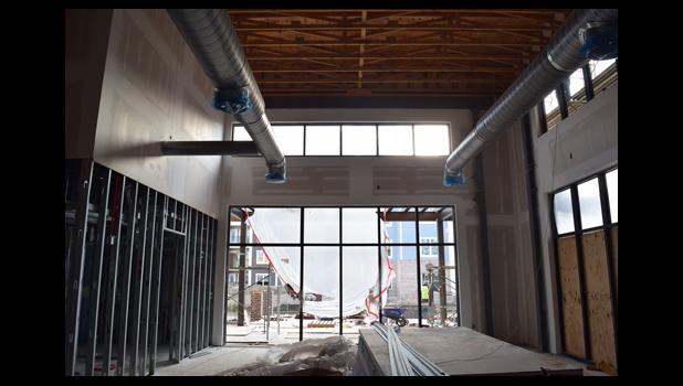 According to founder of Bin 526 Mike White, the new Starbucks location on Daniel Island will feel like a “cathedral of coffee” with 30-foot ceilings and plenty of seating, both inside and out.