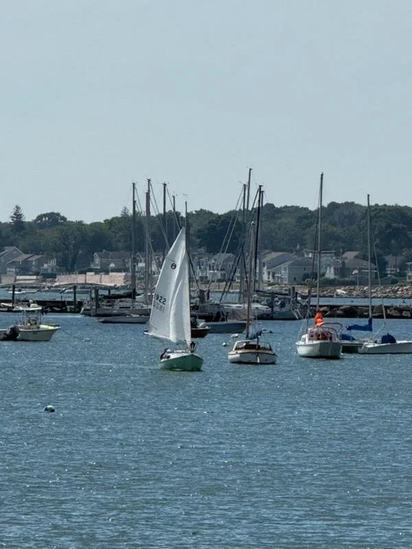 We sailed by the Yacht Club and checked out the boats as I had done with Chris.