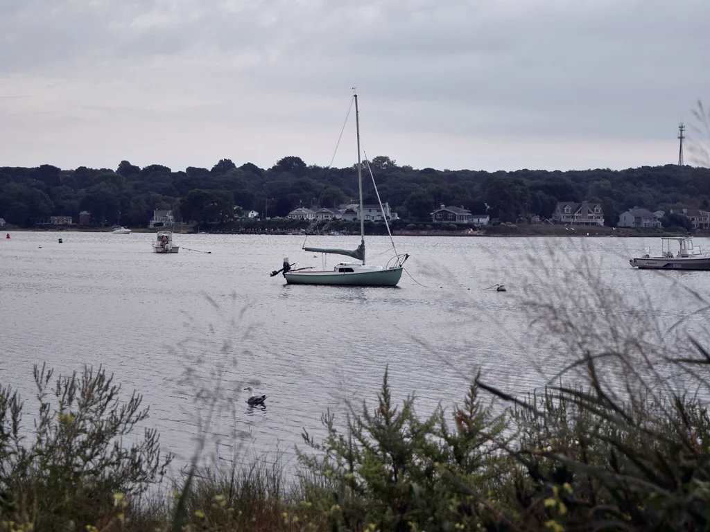 We got back to the mooring just in time; the skies turned dark as a cold front made its way through. A good first sailboat trip!