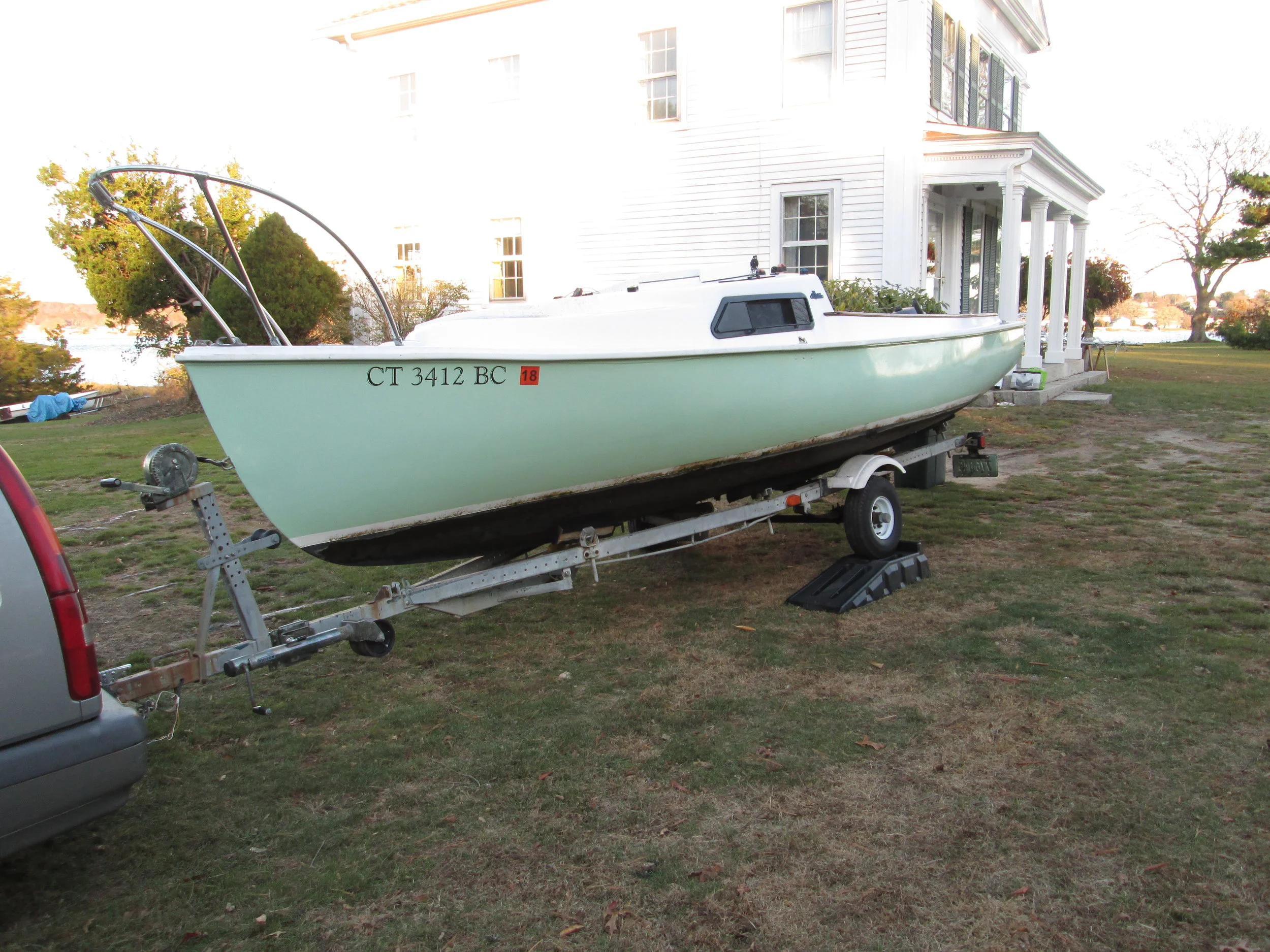  November 11th: After a long period of inactivity, I finally took ORION out of the water to prepare her for the long winter months. I backed one side of the trailer up on a ramp so I could power-wash the bottom. 