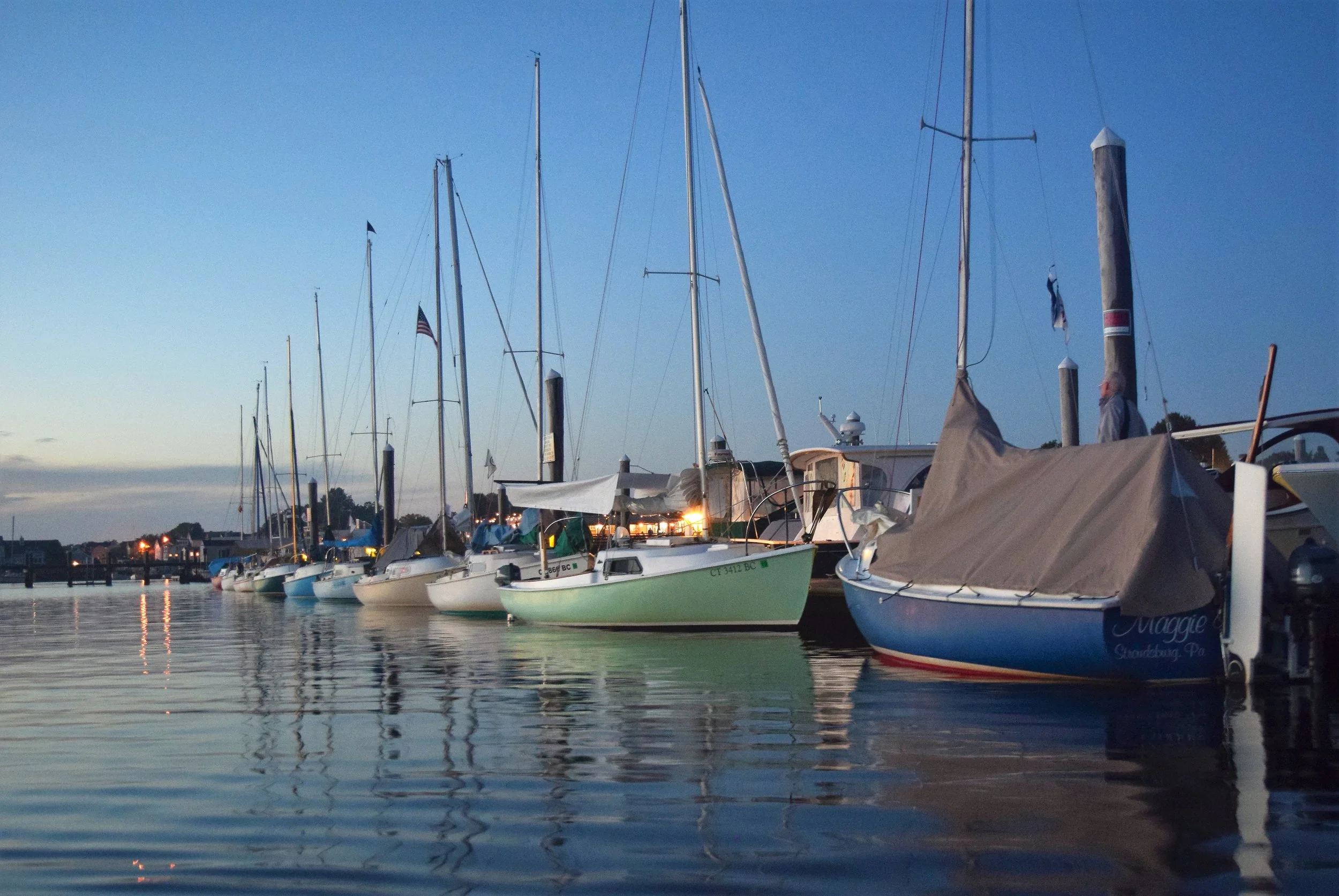  The rain on Saturday evening finally went away, and I took this photo of all the boats at sunset. Every Mariner has a unique color! 