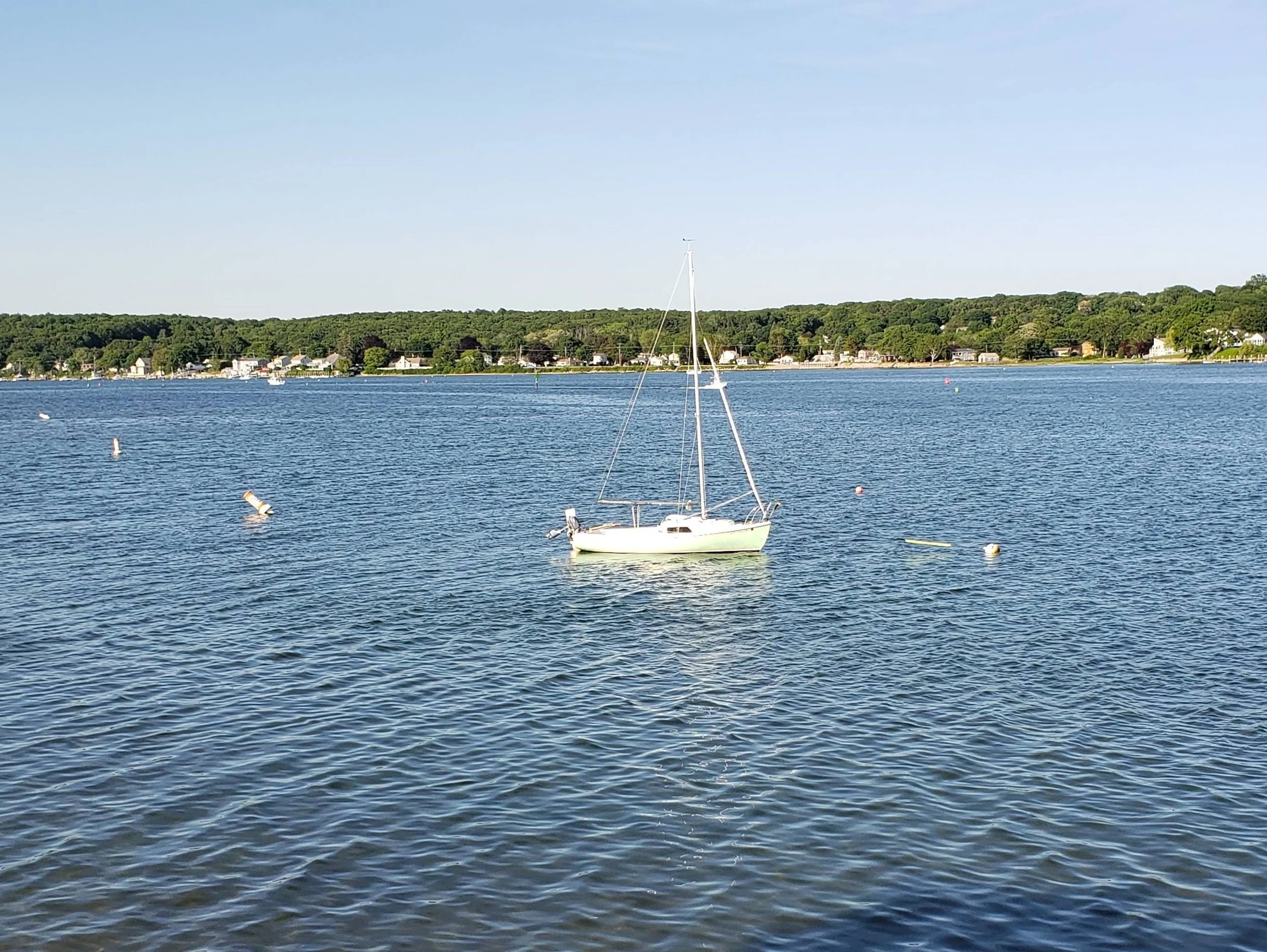 June 8th: The Niantic River tide was high enough to allow a beach launching from my parents’ place, saving a lot of time instead of going to the launch ramp in Waterford. She doesn’t have her mainsail bent on yet, but hopefully I’ll do that this coming week.