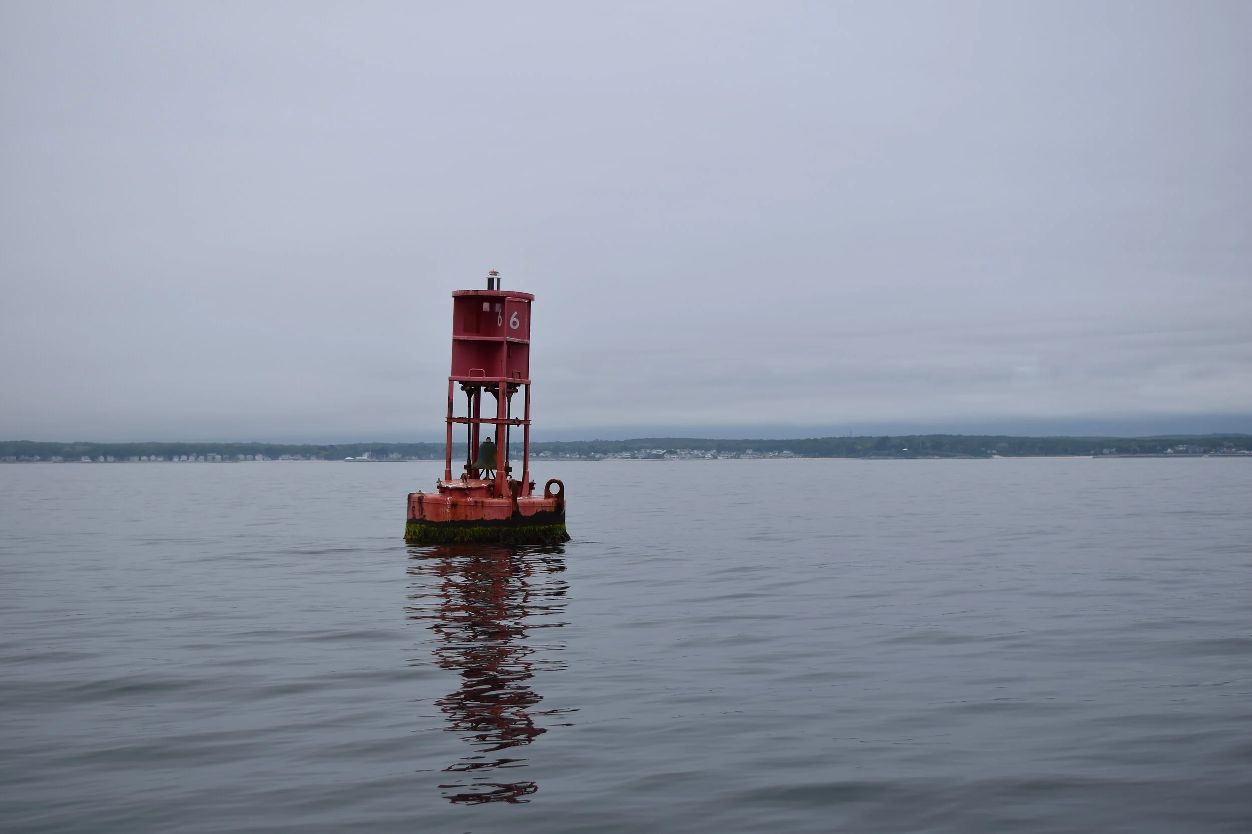  June 3rd: Overcast skies and almost no wind didn’t keep me from motoring around Millstone Point to Jordan Cove for lunch, passing by the bell buoy south of Little Rock on the way. 