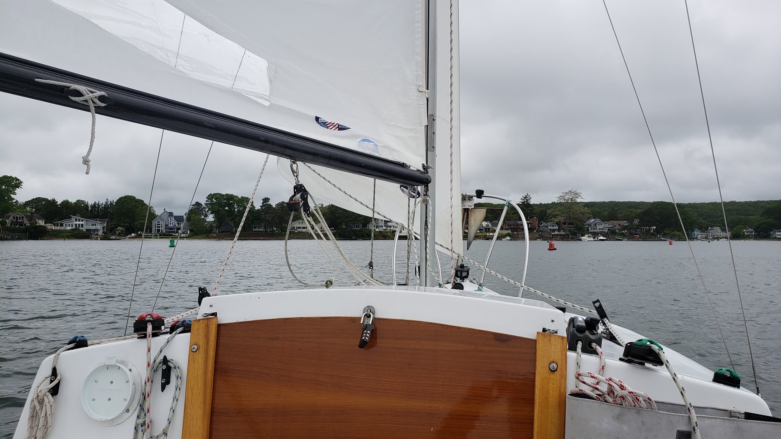 May 29th: It was a cool day with light winds when we finally got to take our first official sail in the Niantic River. I fixed an upside-down sail slug and made other small adjustments.