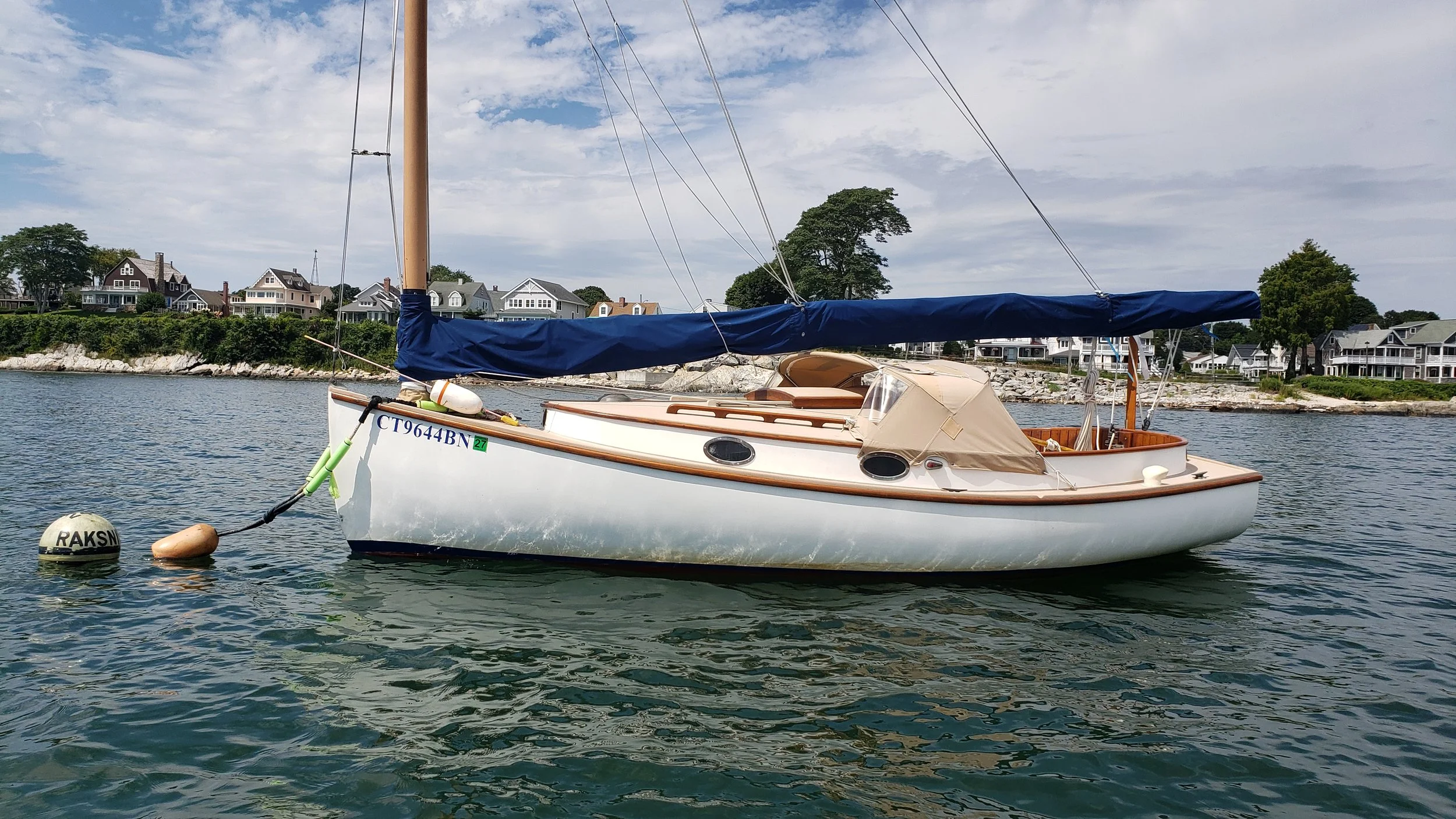 We sailed by the Niantic Bay Yacht Club where there are a number of nice boats, including this beautifully-kept catboat.